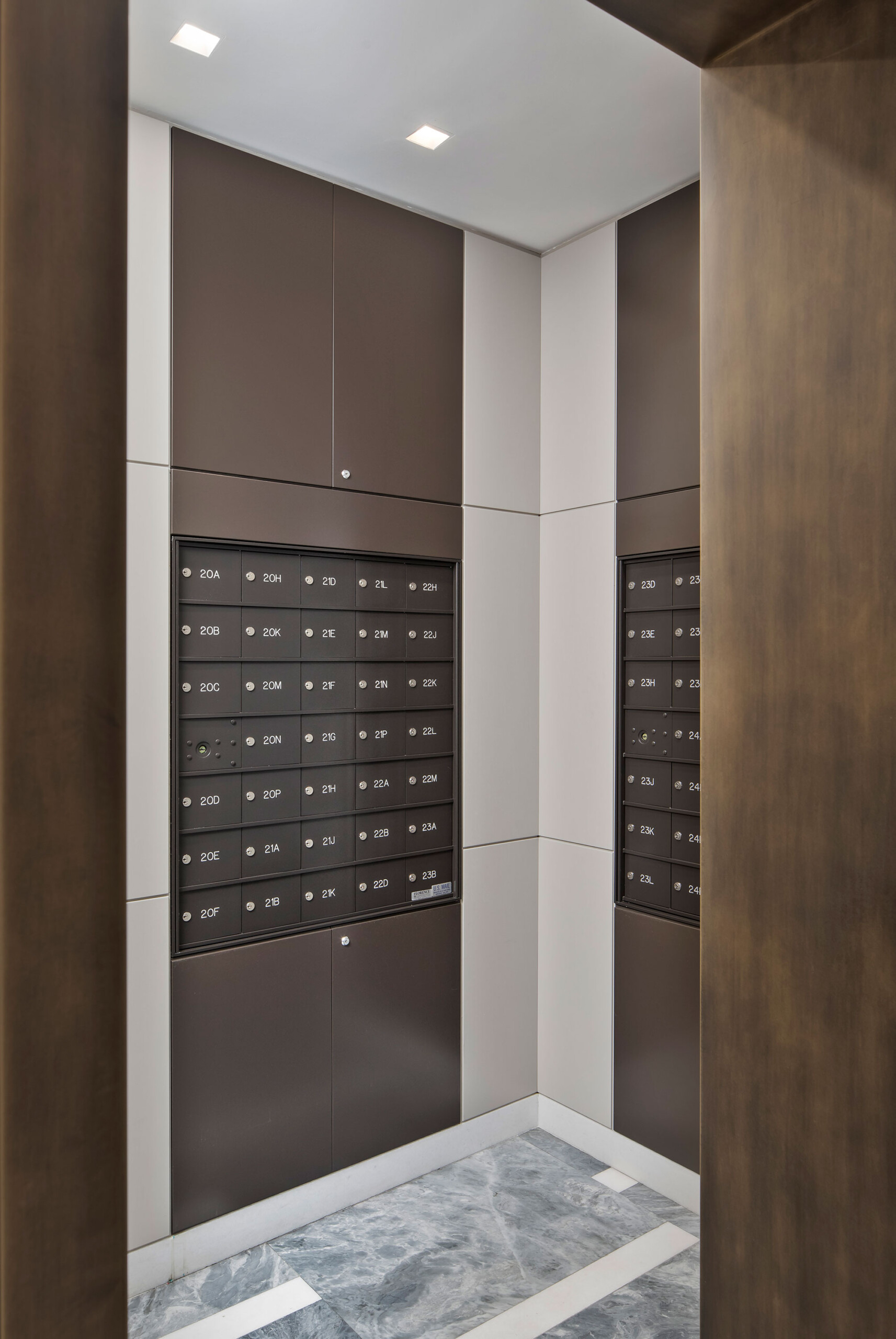 111 West 67th Street - Mail room of luxe Upper West Side lobby. Interior design by Pembrooke &...