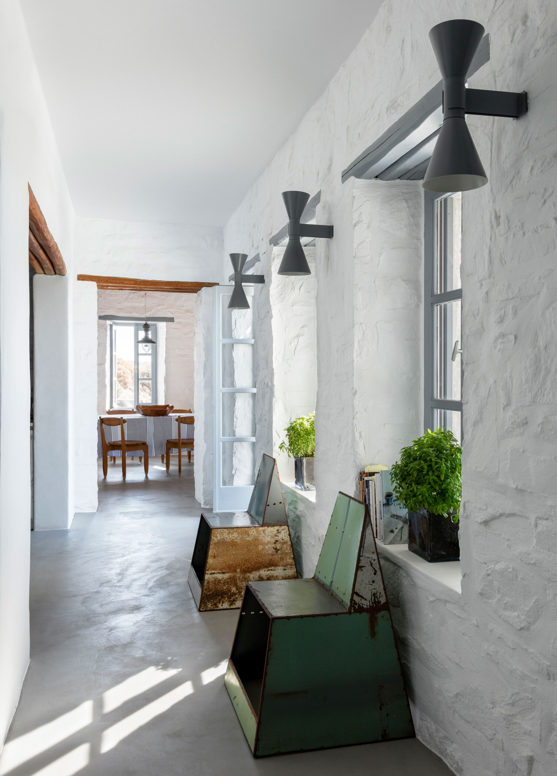 Cycladic Villa - Scandinavian-inspired hallway in a Greek villa. Interior design by Pembrooke &...