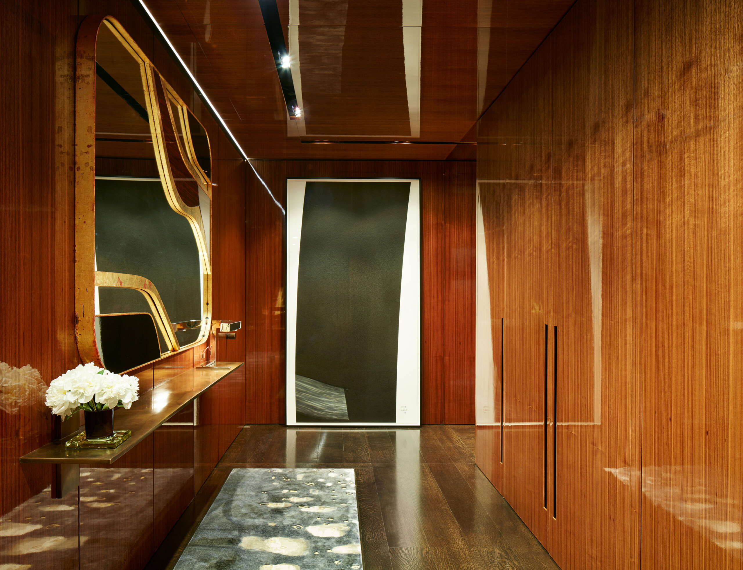 Fifth Avenue Pied-a-Terre - Pembrooke & Ives Entry hallway of luxury New York home featuring large...