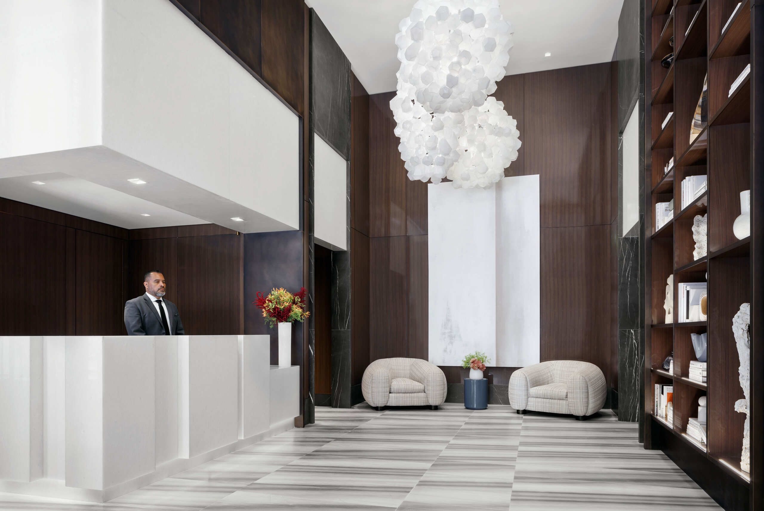 The Park Loggia - Modern lobby reception in luxury New York residential building. Interior design...