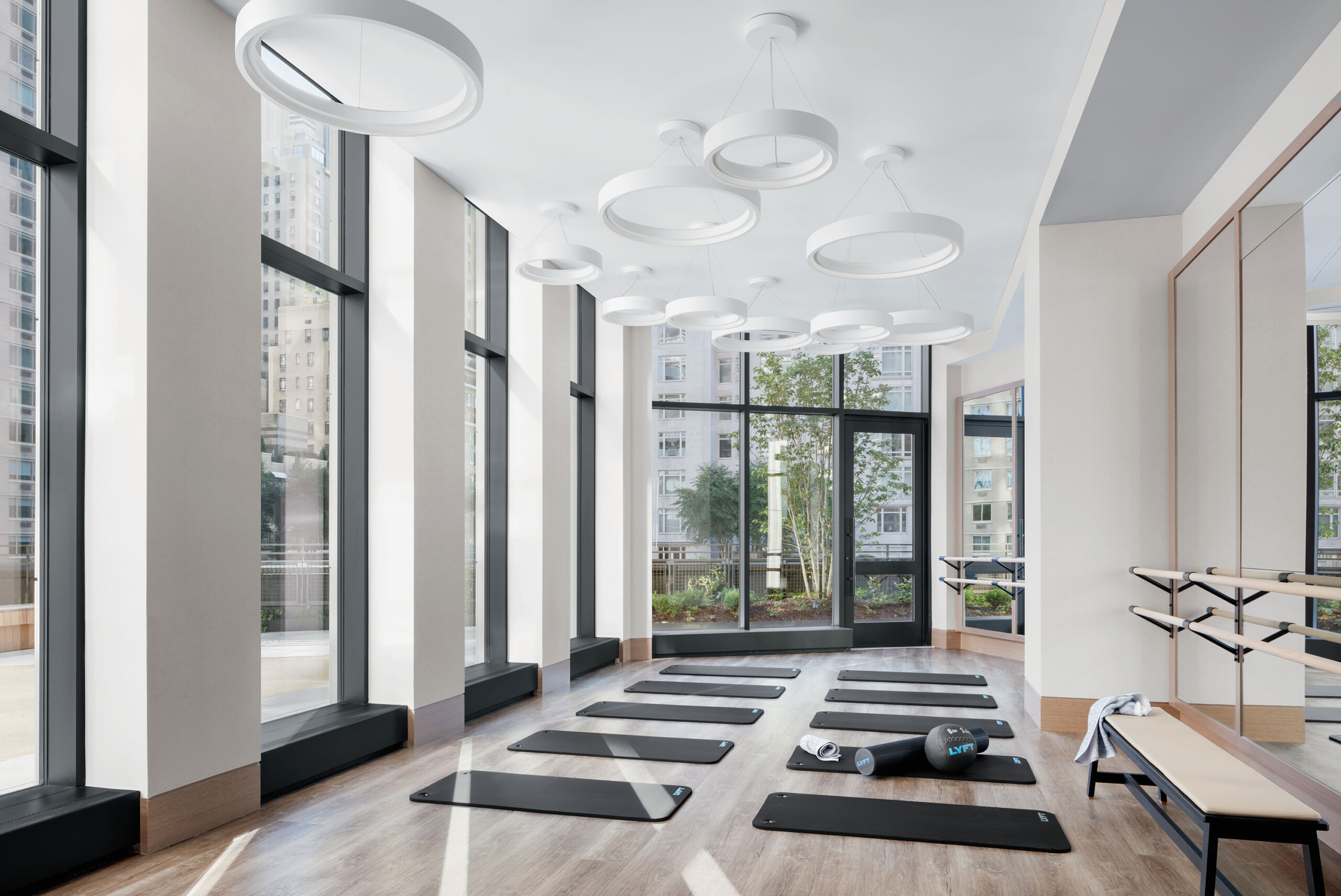 The Park Loggia - Modern gym and yoga studio in luxury residential building, New York. Interior...