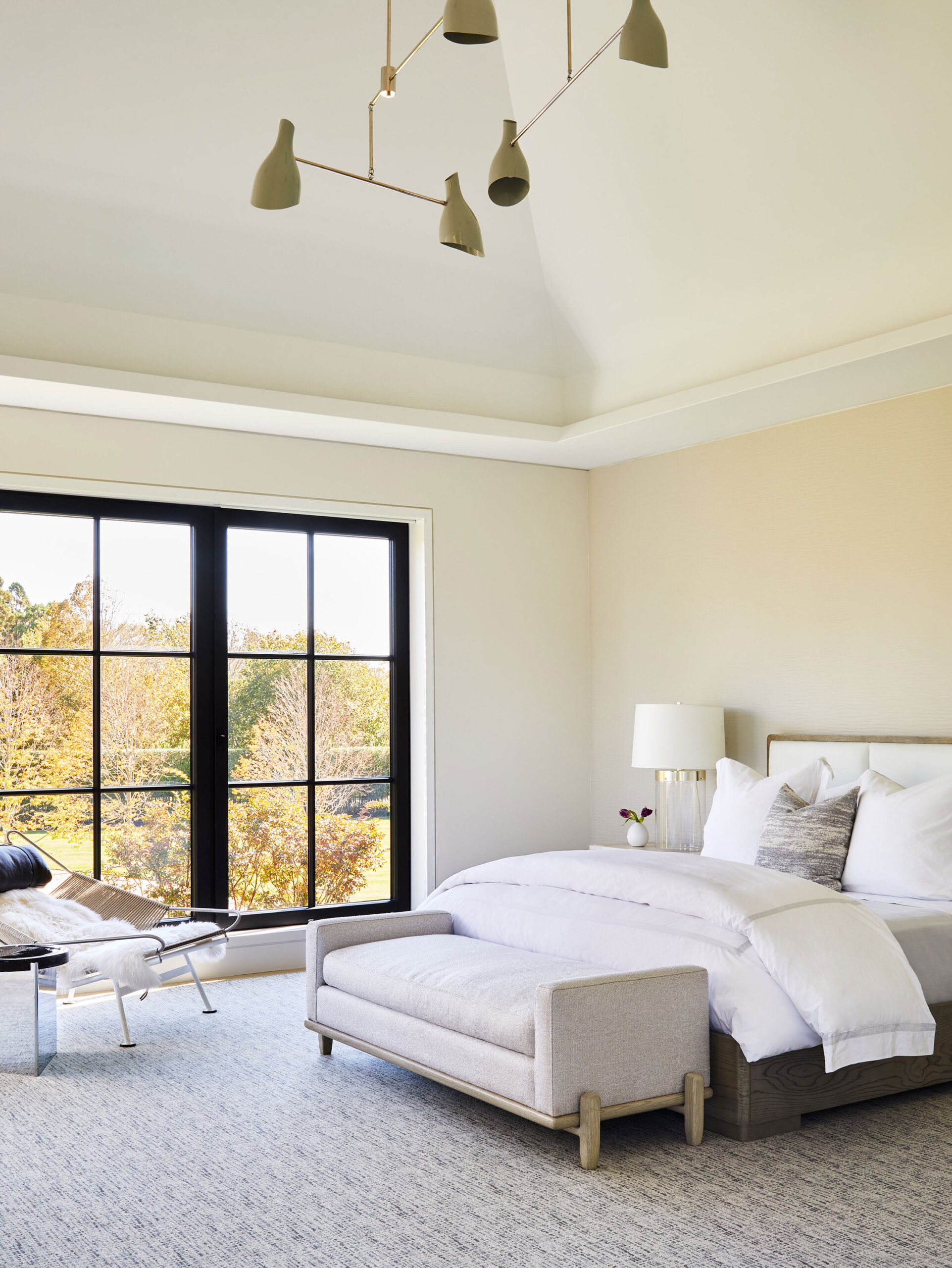 Southampton Estate - Pembrooke & Ives - Neutral white bedroom with upholstered bench seat, lounge...