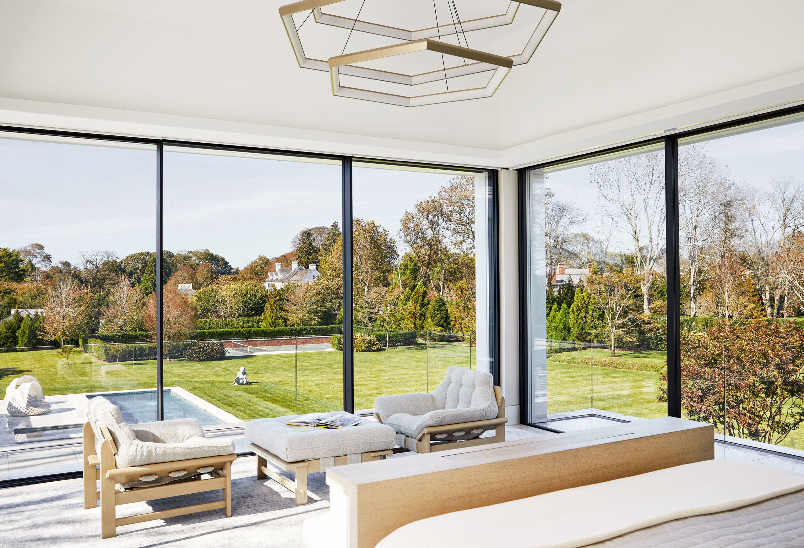 Southampton Estate - Pembrooke & Ives - Southampton bedroom with lounge seating area, hexagonal...