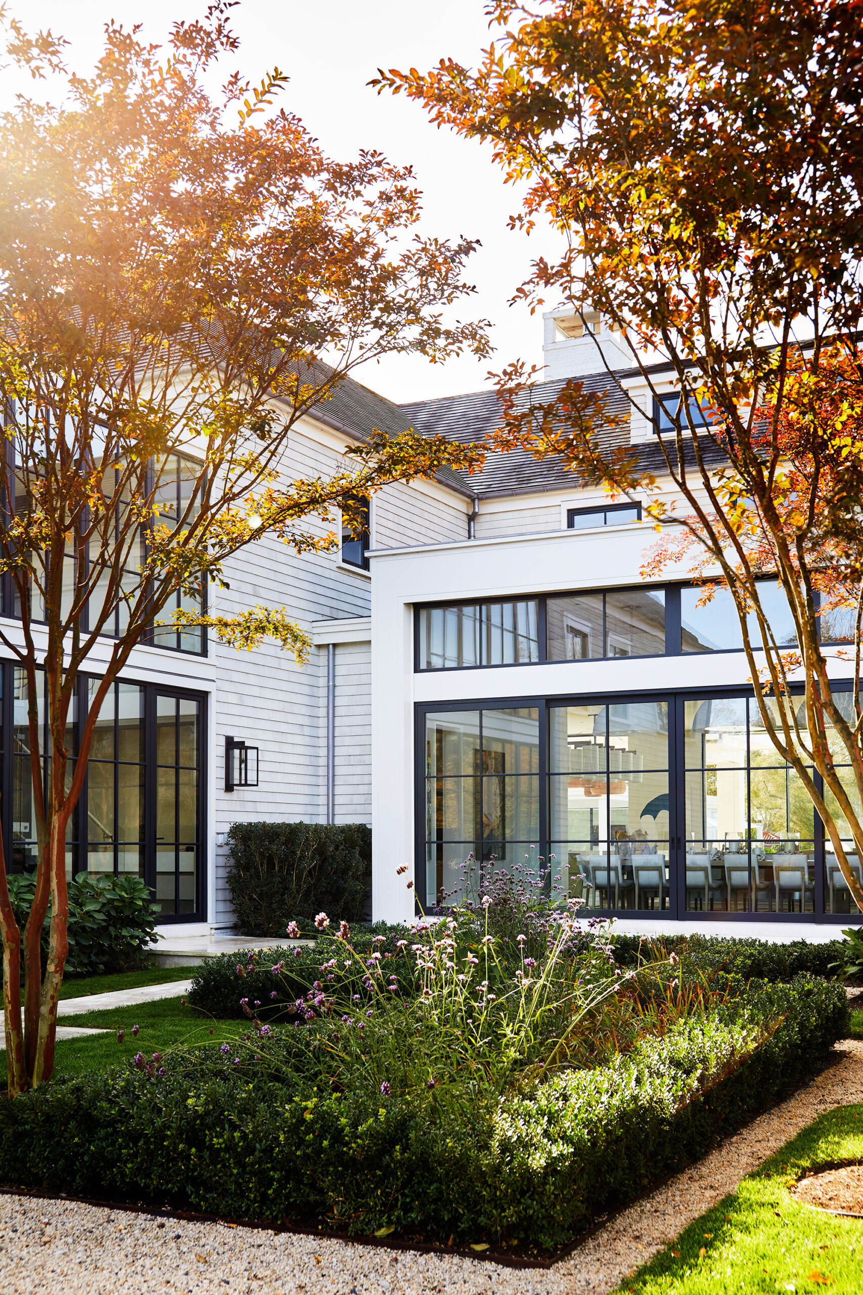 Southampton Estate - Pembrooke & Ives - Southampton estate landscaped backyard. Interior design...