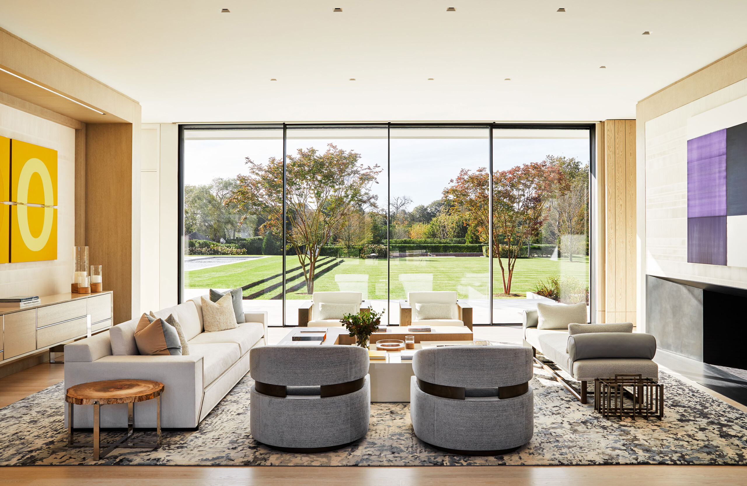 Southampton Estate - Pembrooke & Ives - Open living room featuring neutral tones, modern art, and...