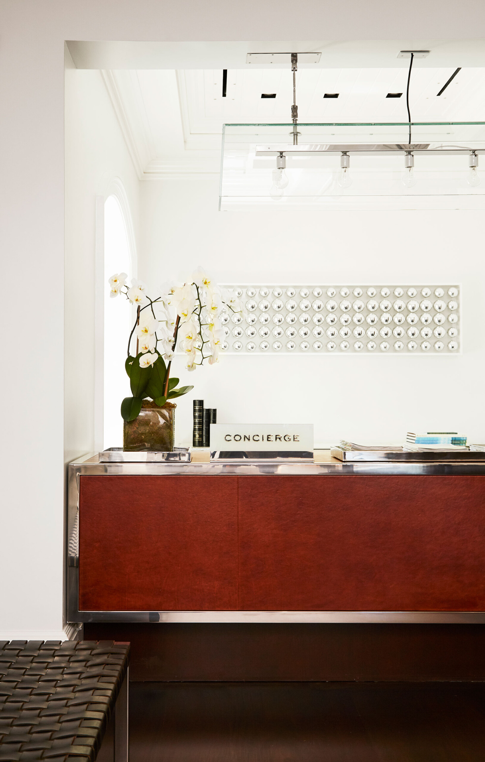 East Hampton Golf Club - Lobby reception at East Hampton golf club with wood and metallic desk...