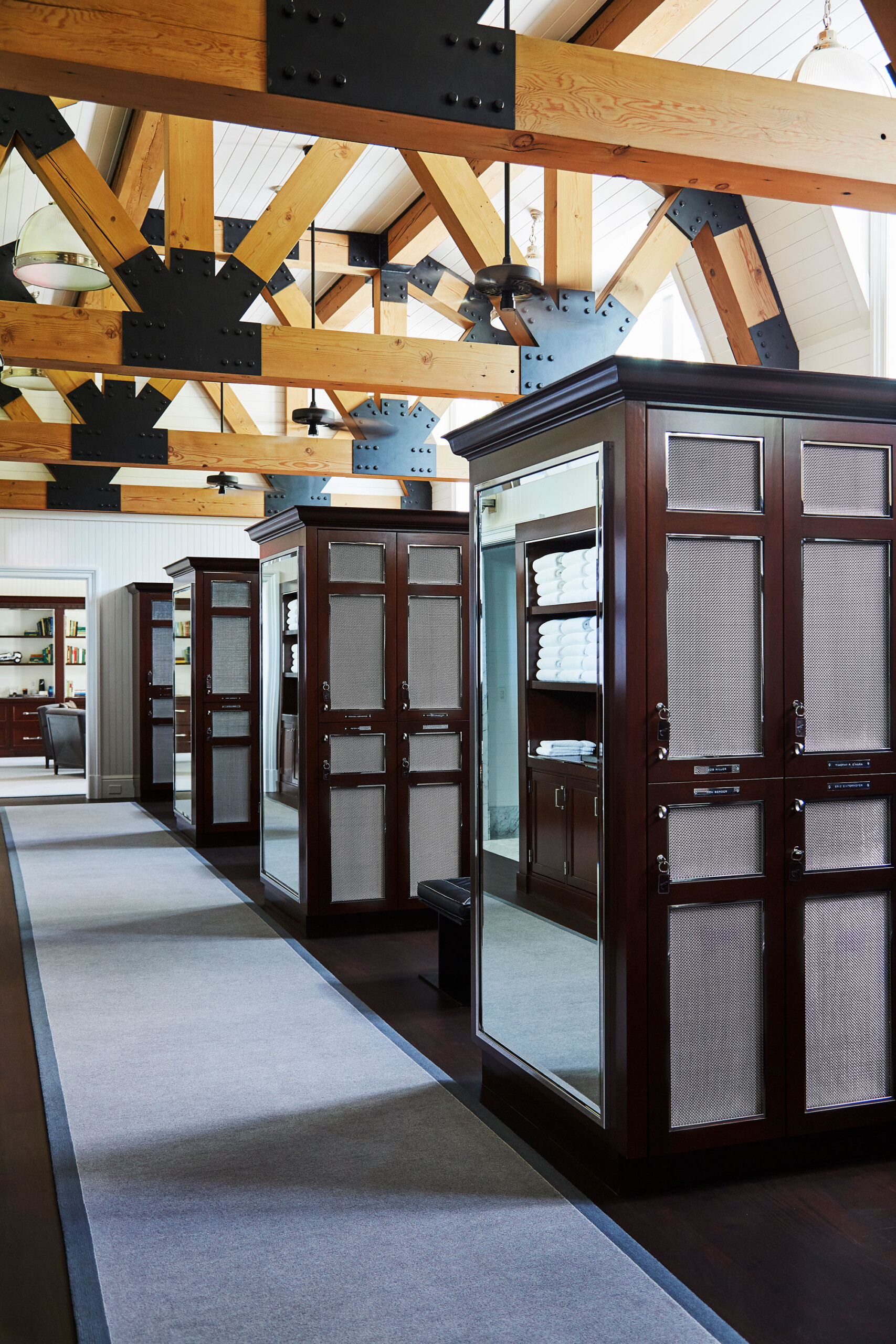 East Hampton Golf Club - Lockers in luxury East Hampton golf club with dark wood, large mirrors,...