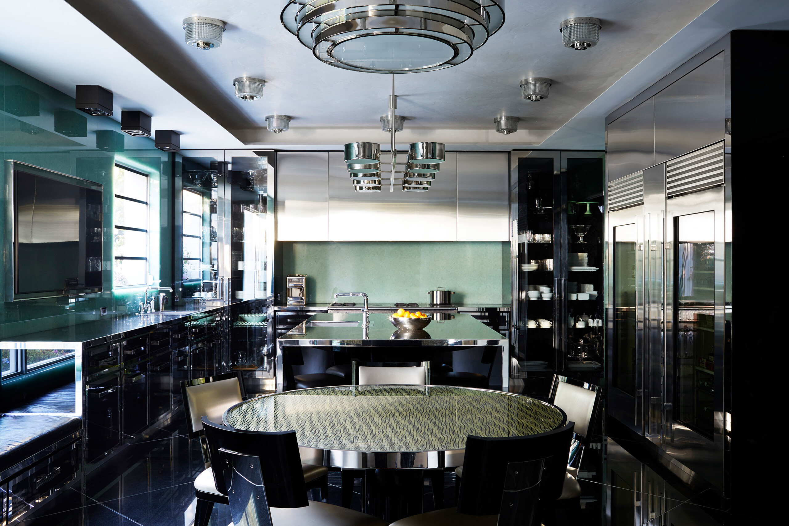 Historic West Palm Beach - West Palm Beach kitchen with chrome finishes. Interior design by Pembrooke...