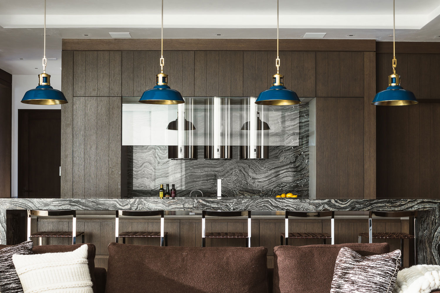 Red Mountain - Modern kitchen of mountain vacation home with ash wood cabinetry, bright blue and...