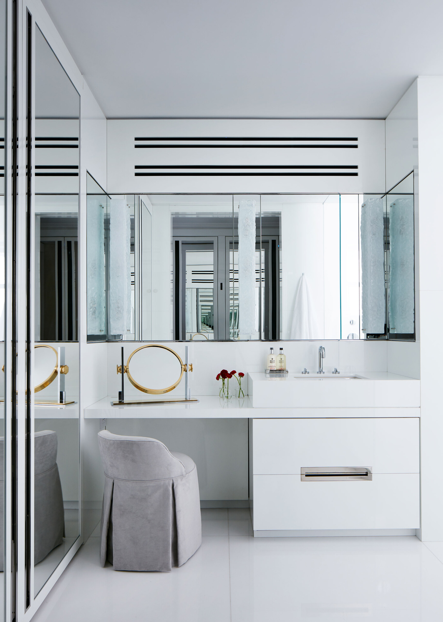 Fifth Avenue Pied-a-Terre - Pembrooke & Ives Modern minimalist white vanity in luxury bathroom...