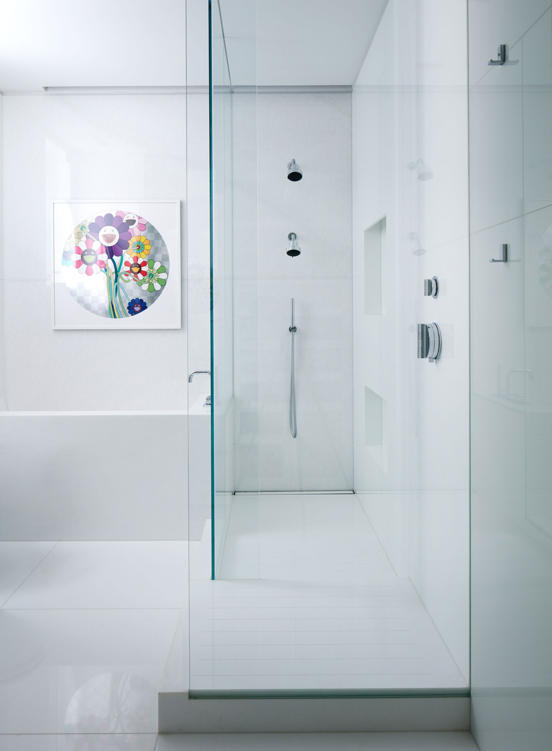 Fifth Avenue Pied-a-Terre - Pembrooke & Ives All-white modern bathroom with minimalist tilework...