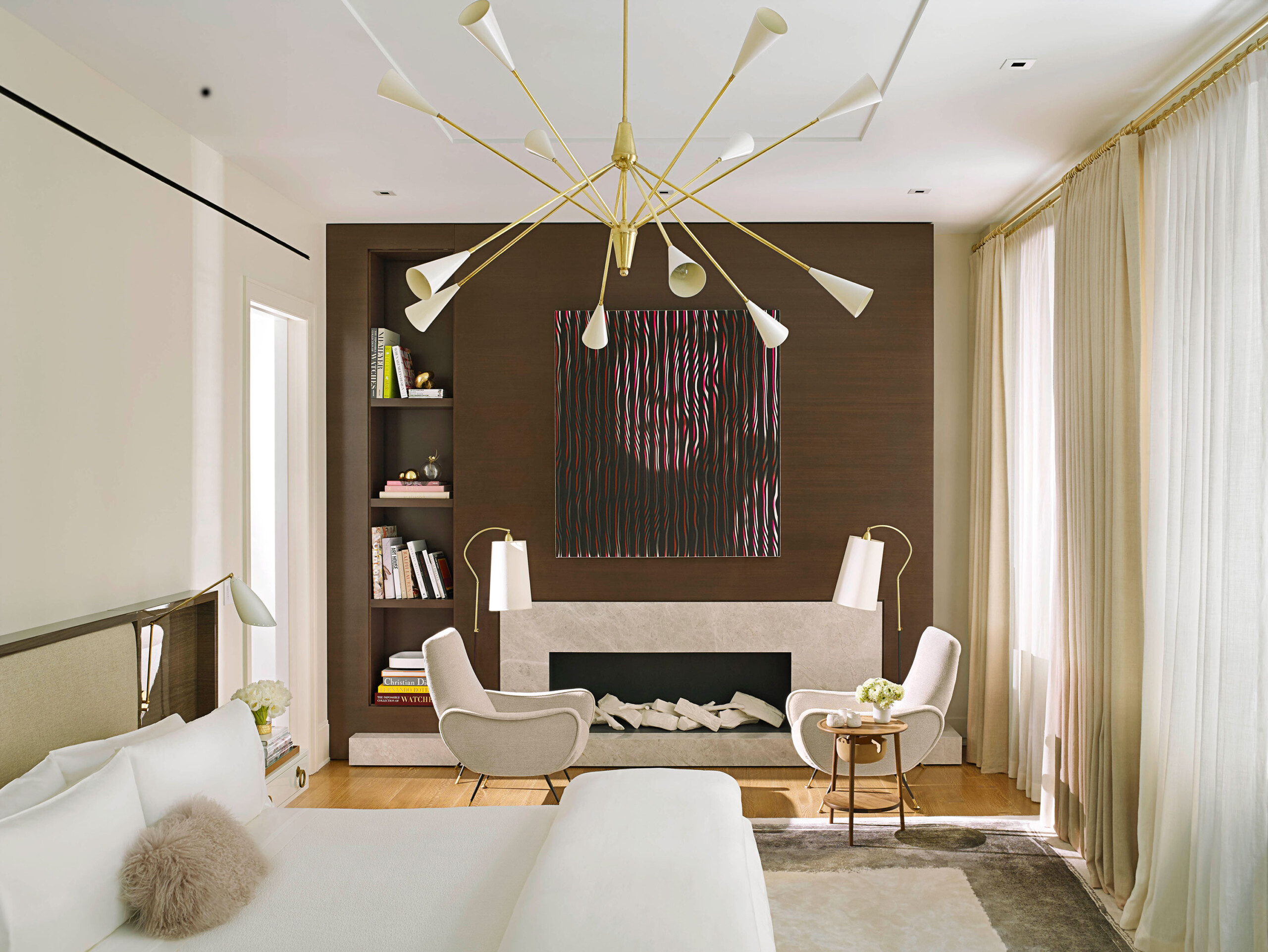 Madison Square Park - Modern bedroom in New York City apartment featuring a cozy seating area with...