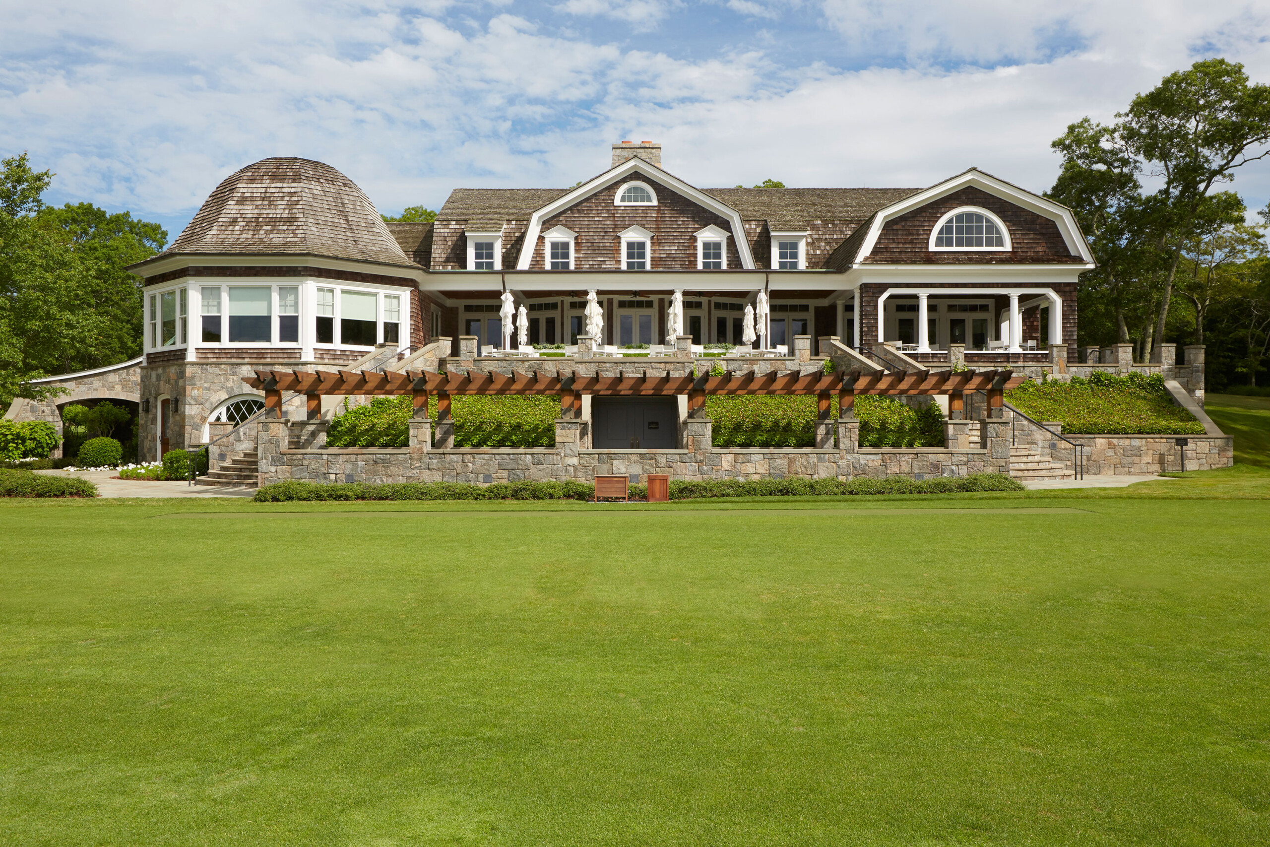 East Hampton Golf Club - East Hampton golf club backyard exterior landscaping. Hospitality design...