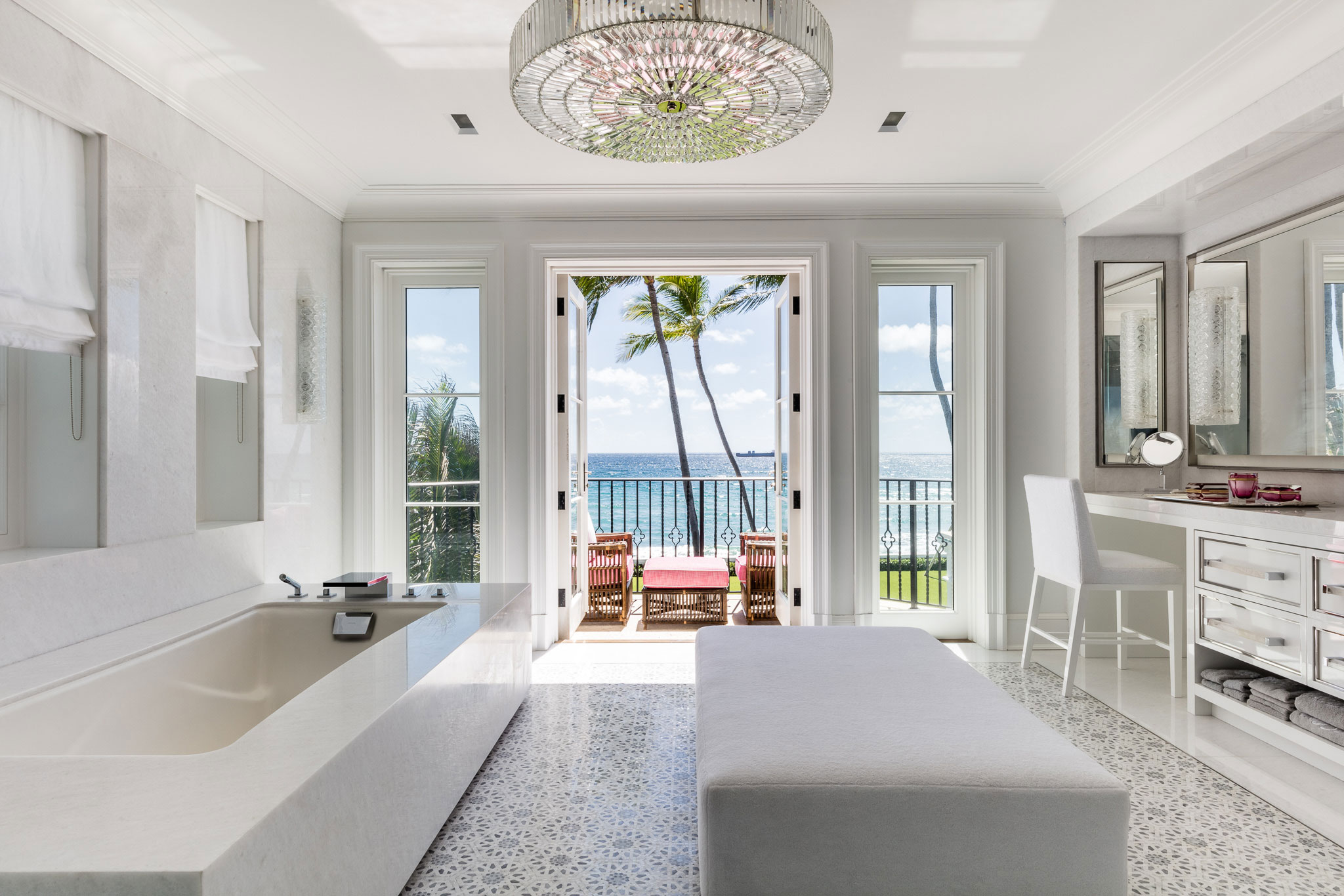 Ocean-front Compound - White squared tube and vanity in modern coastal ocean-front bathroom. Interior...