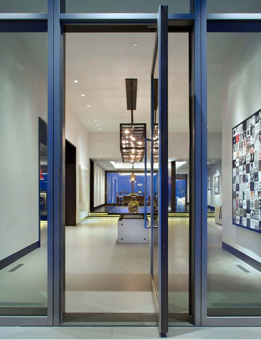 Modern Mountain - Modern entryway through glass doors. Interior design by Pembrooke & Ives. Photography...