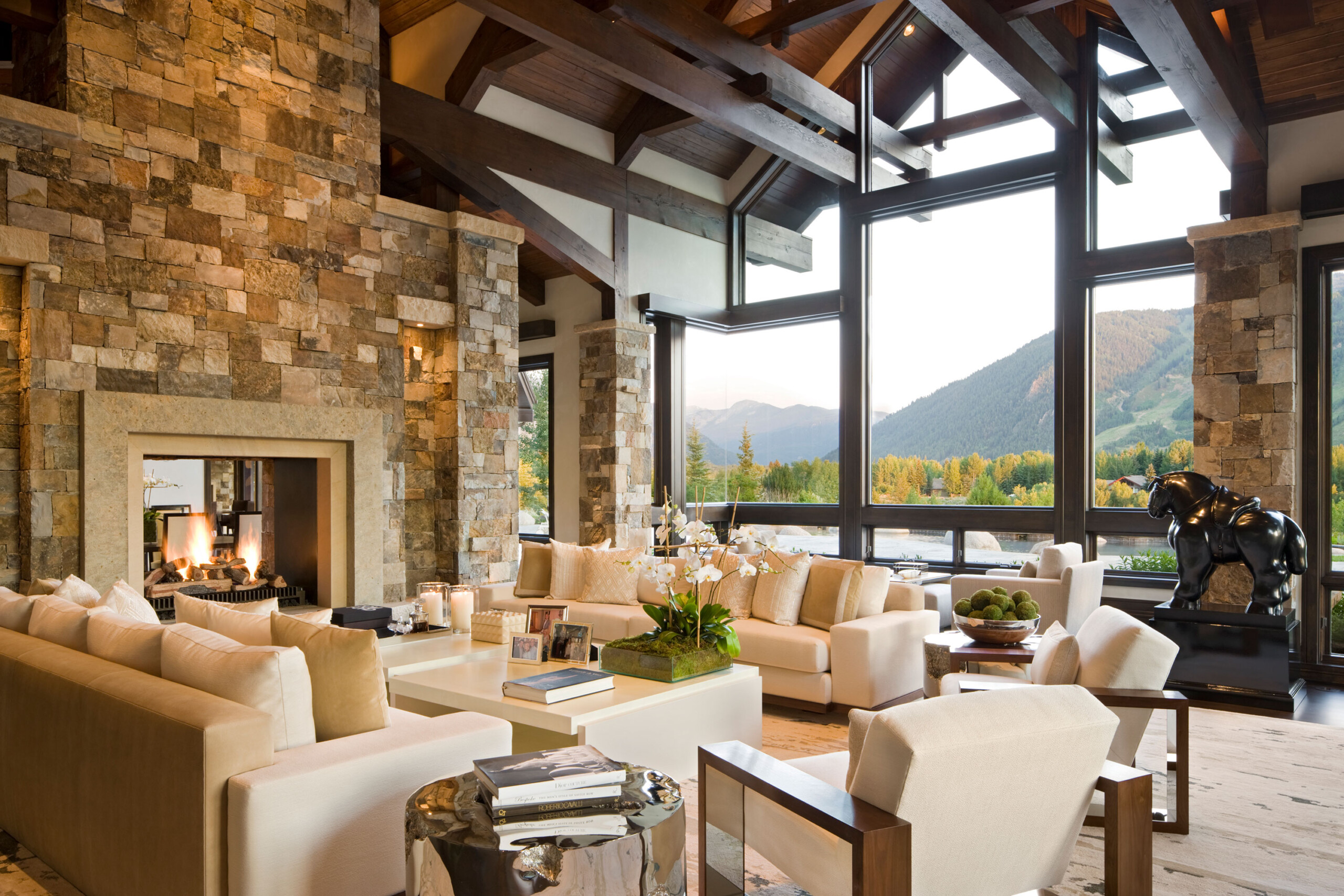 Willoughby Way - Transitional lounge area in Colorado retreat with neutral tones and scenic view....