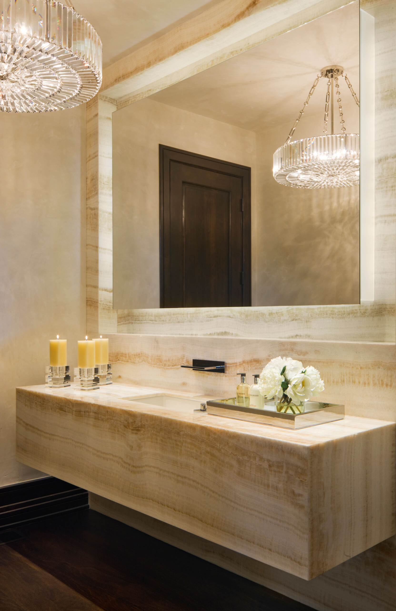 Willoughby Way - Luxury powder room marble vanity with statement glass chandelier in transitional...