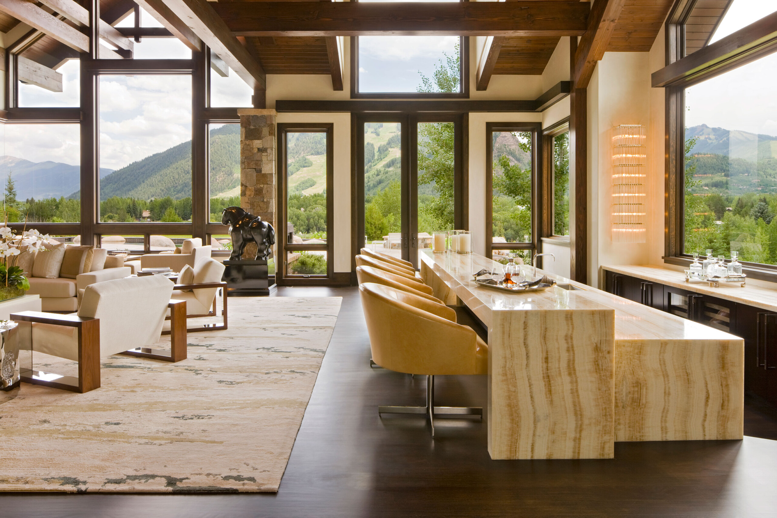 Willoughby Way - Luxury transitional lounge bar with neutral tones in Colorado retreat. Interior...