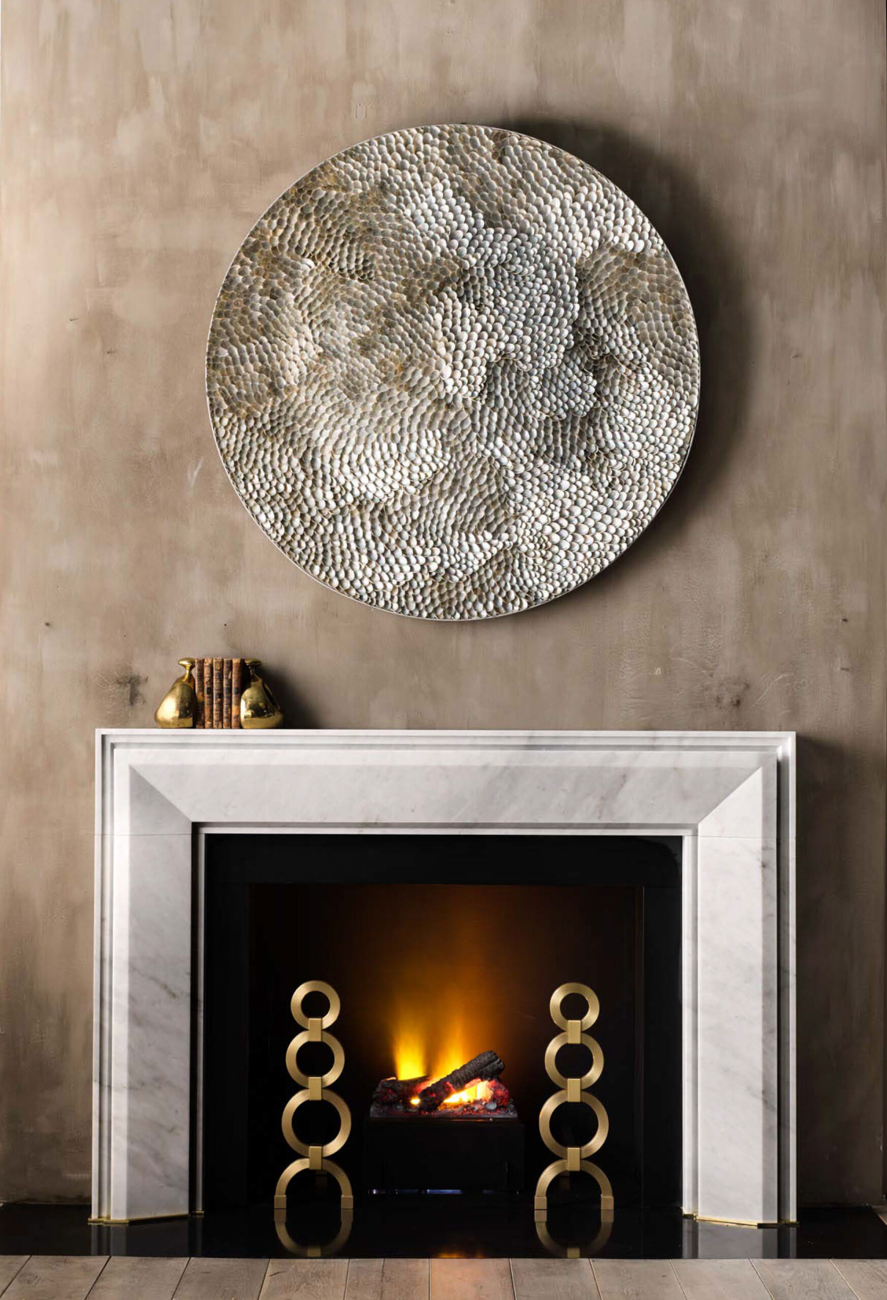 Chesneys white marble custom fireplace. Designed by Pembrooke & Ives.