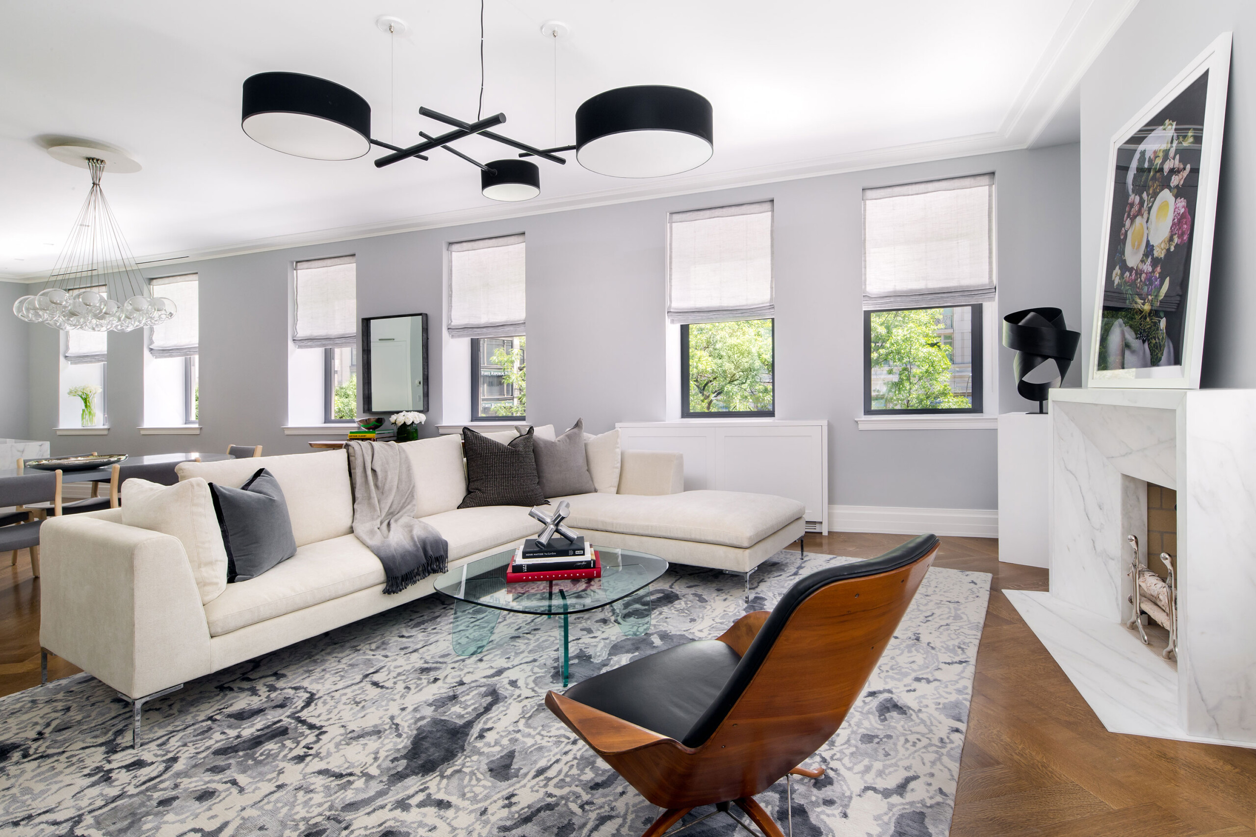 The Astor - Modern living room in The Astor, New York. Interior design by Pembrooke & Ives.