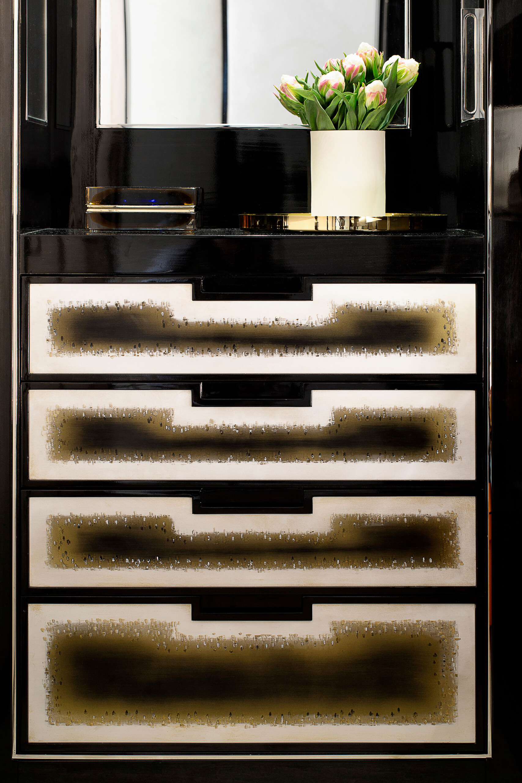 Glamour on Park - Shelving inside Park Avenue home's walk-in closet. The dresser focuses on black,...
