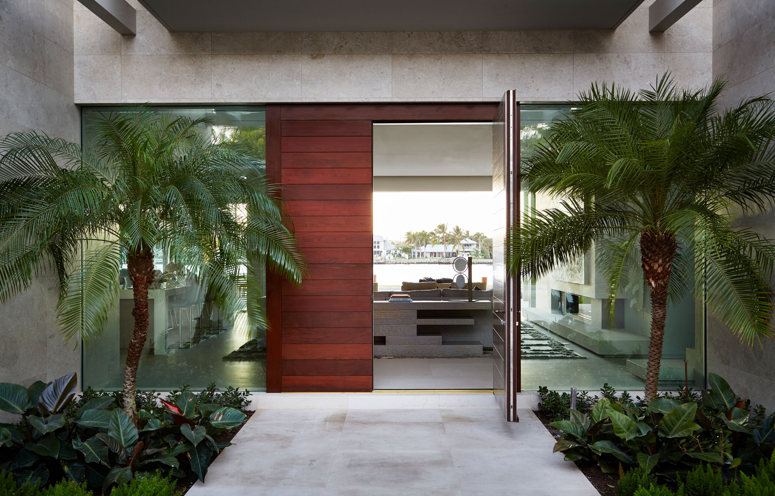 Lost Tree Way - Entryway of modern Palm Beach, FL home. Interior design by Pembrooke & Ives. Photography...