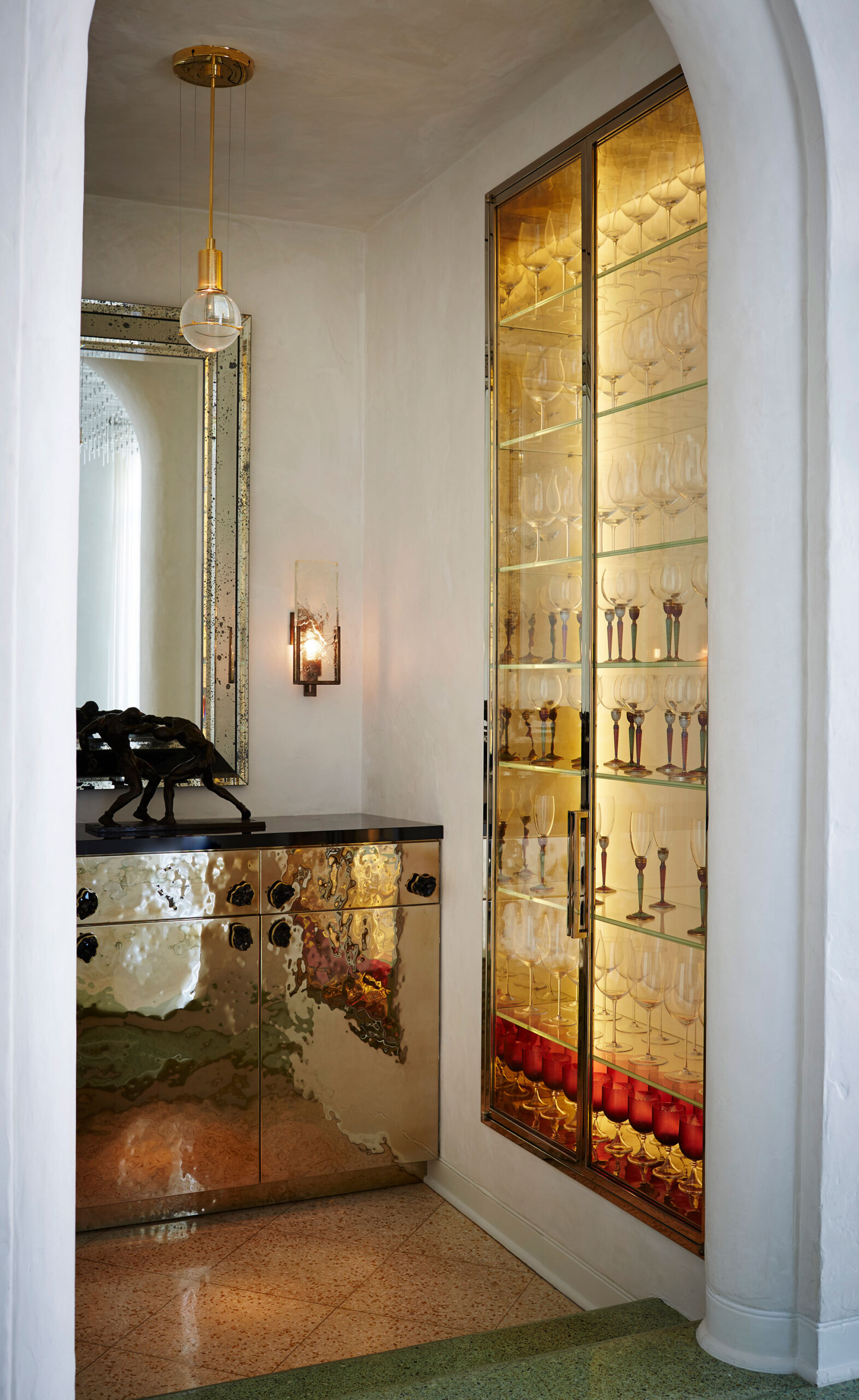 Historic West Palm Beach - Home bar in luxury Palm Beach, FL home with backlit shelving and metallic...