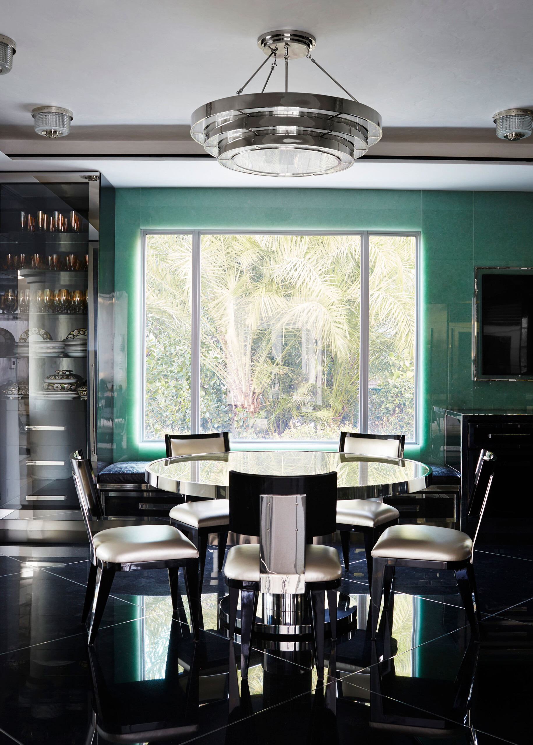 Historic West Palm Beach - Eat in kitchen seating area with chrome accents. Interior design by...