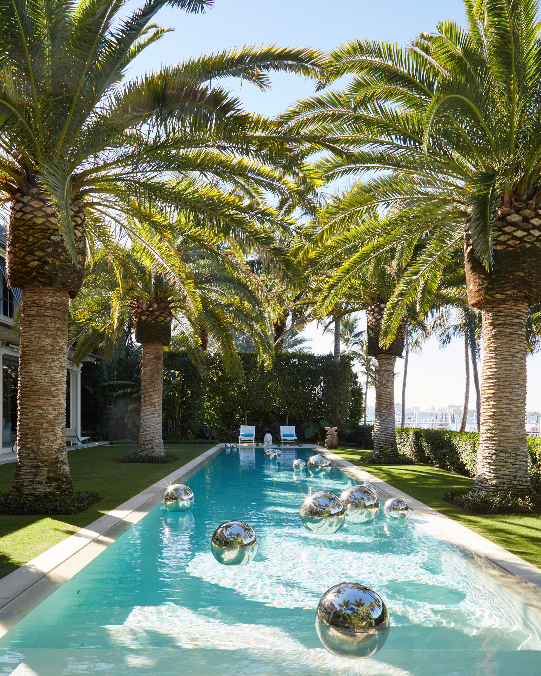 Lakefront Home - Pool in lakefront Palm Beach, FL home. Design by Pembrooke & Ives. Photography...