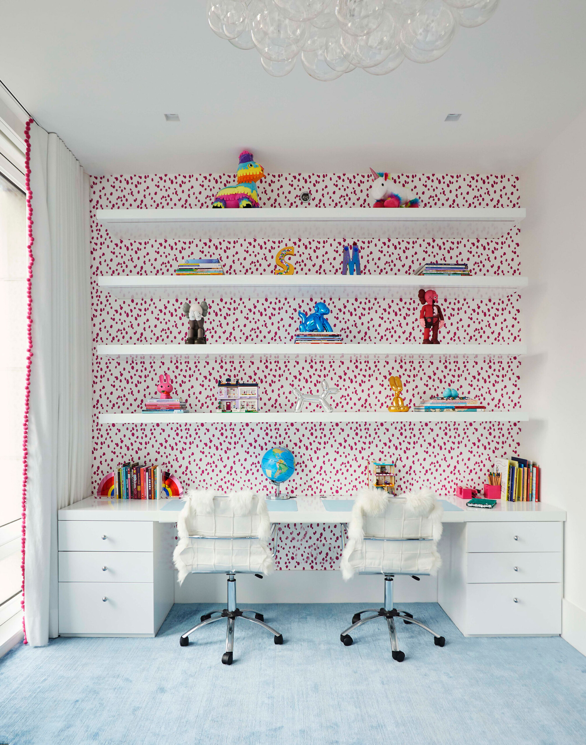 Leonard Street - Home office and desk space with white desk and shelving with accent wallpaper...