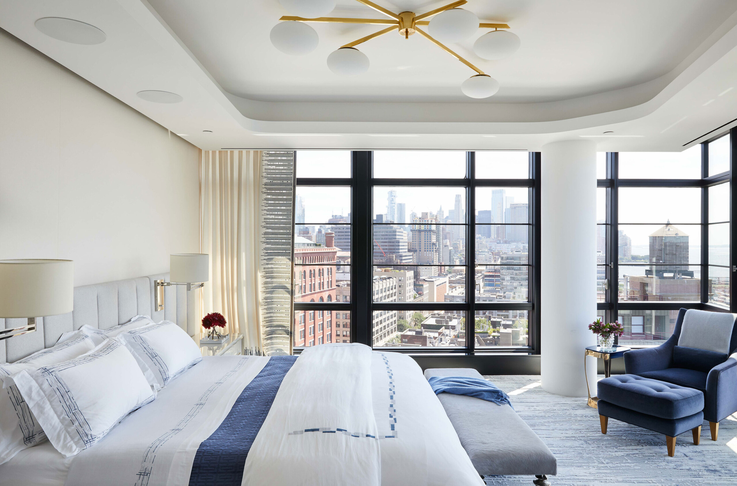 West Village Penthouse - Pembrooke & Ives Modern bedroom with New York view featuring inset ceiling,...