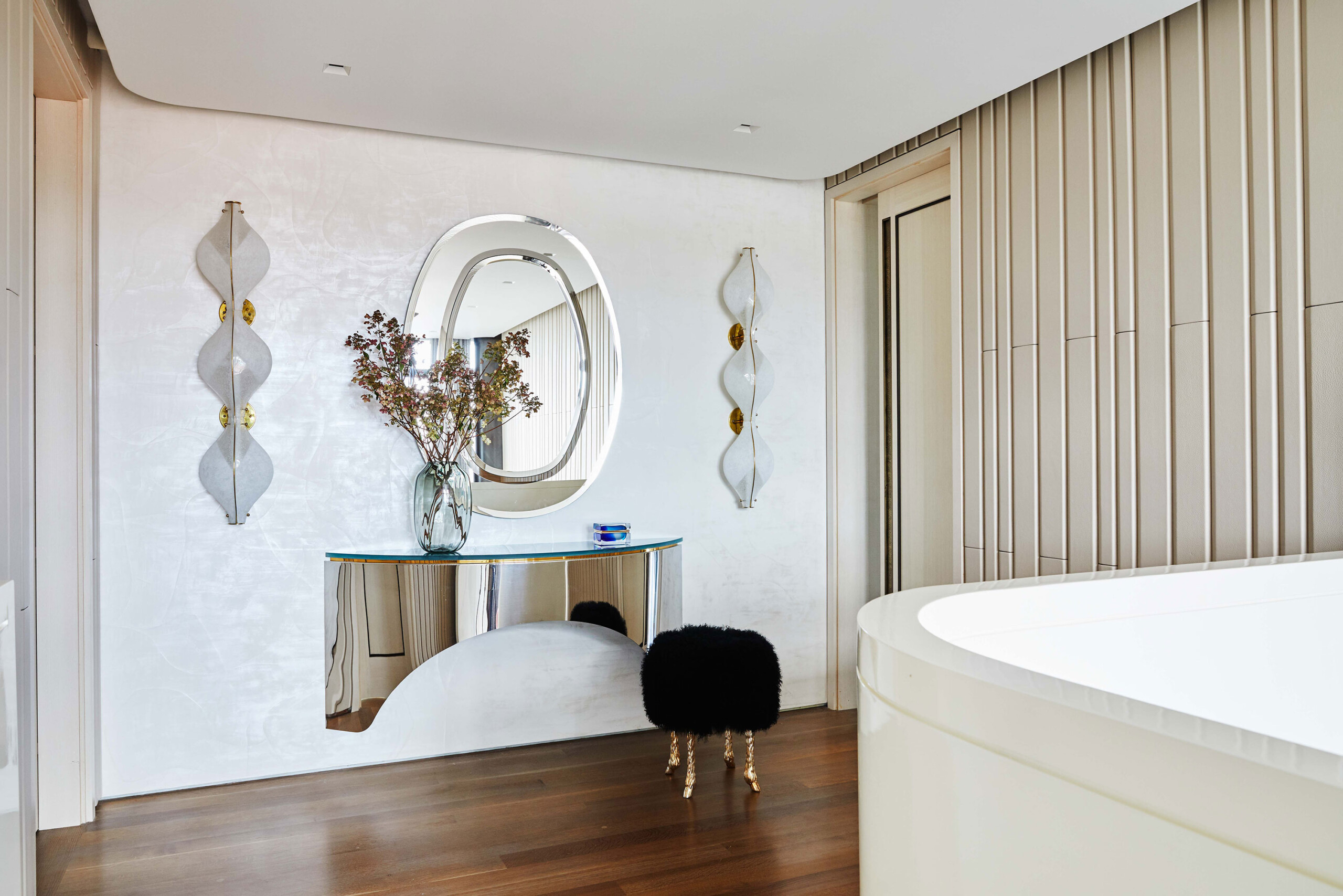 West Village Penthouse - Pembrooke & Ives Upstairs entry of New York home with large oval mirror,...