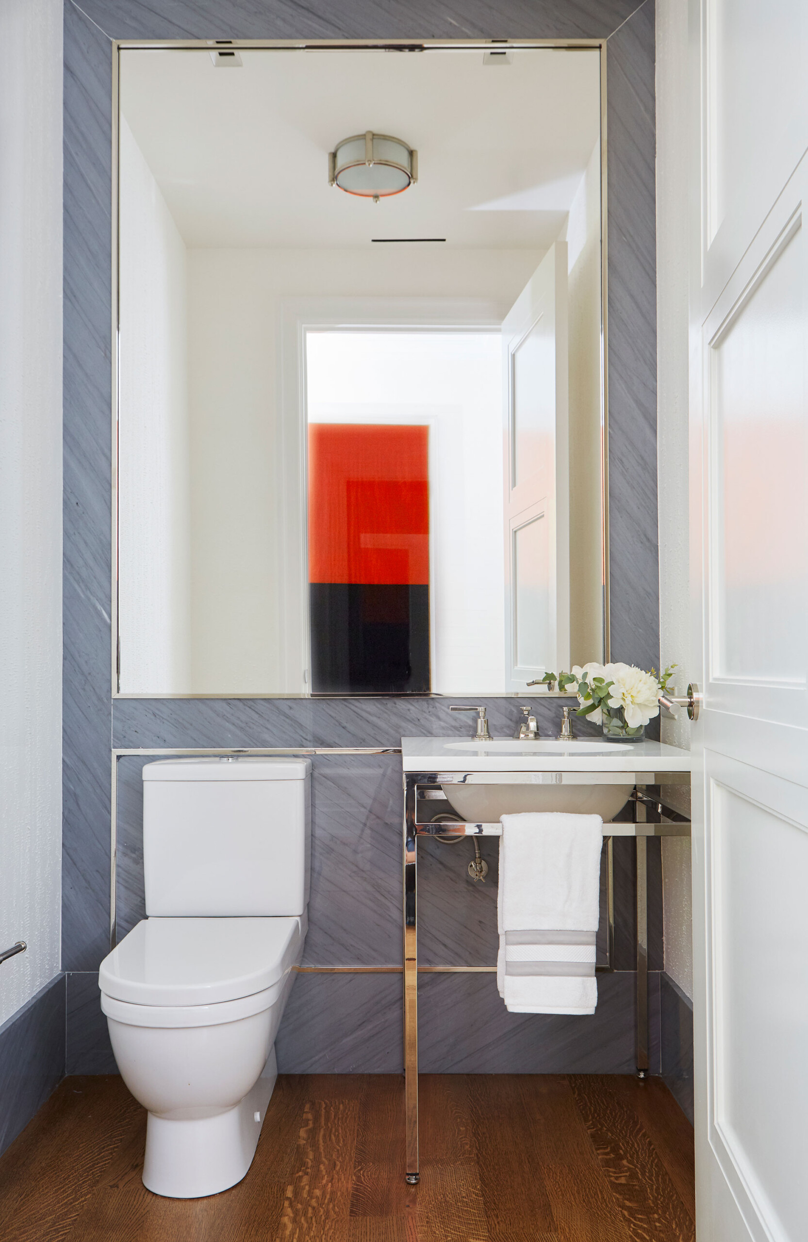 Upper West Side - Contemporary bathroom with polished chrome finishes and stone accent wall. Interior...