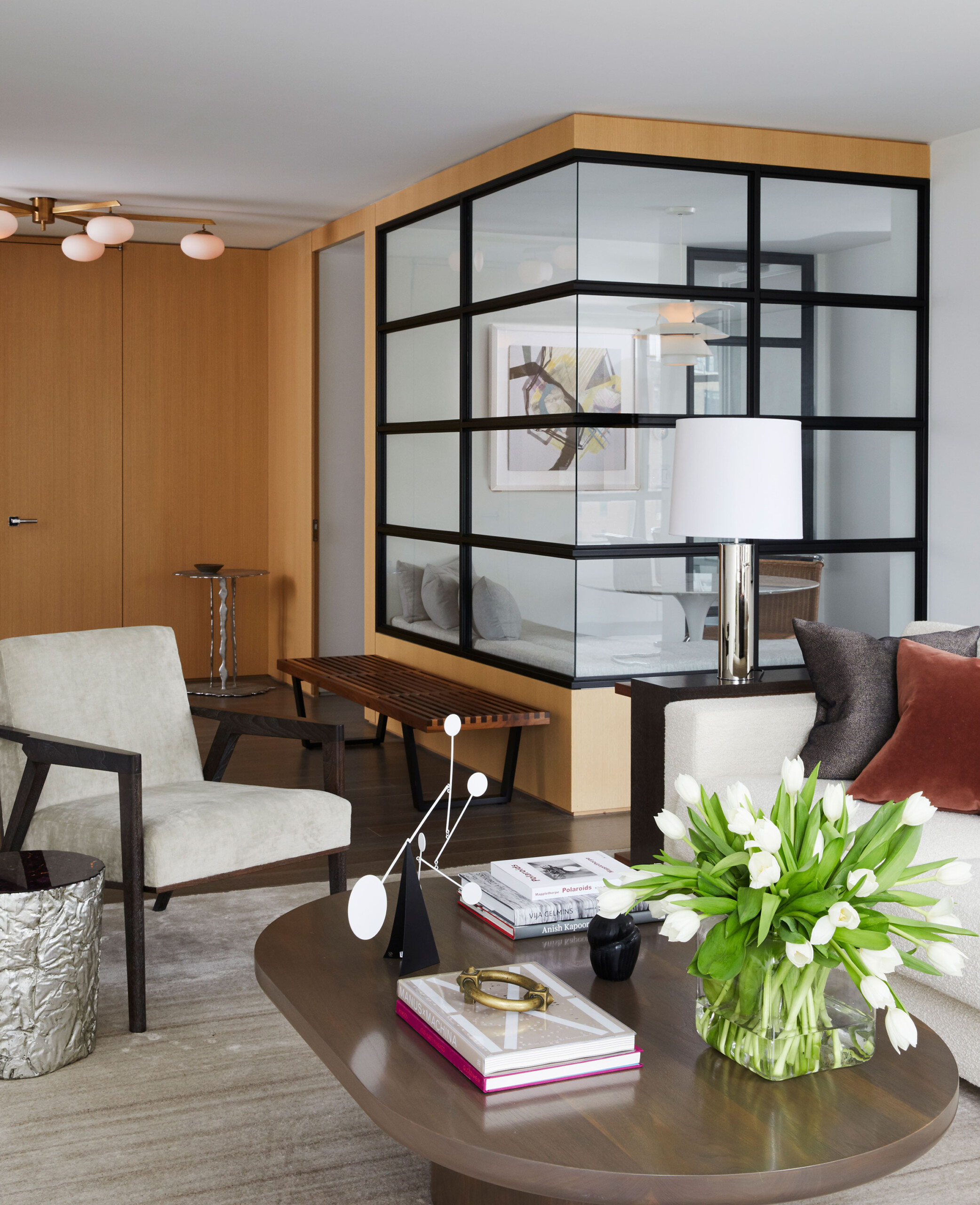 Uptown Pied-á-Terre - Mid-century modern living room with neutral tones in Uptown pied-a-terre....