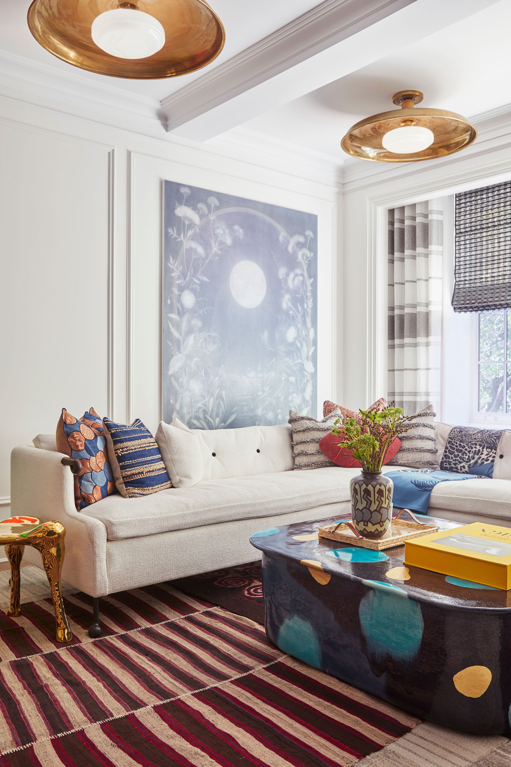 Uptown Eclectic - Pembrooke & Ives - Eclectic living room design with modern art and colorful accents....