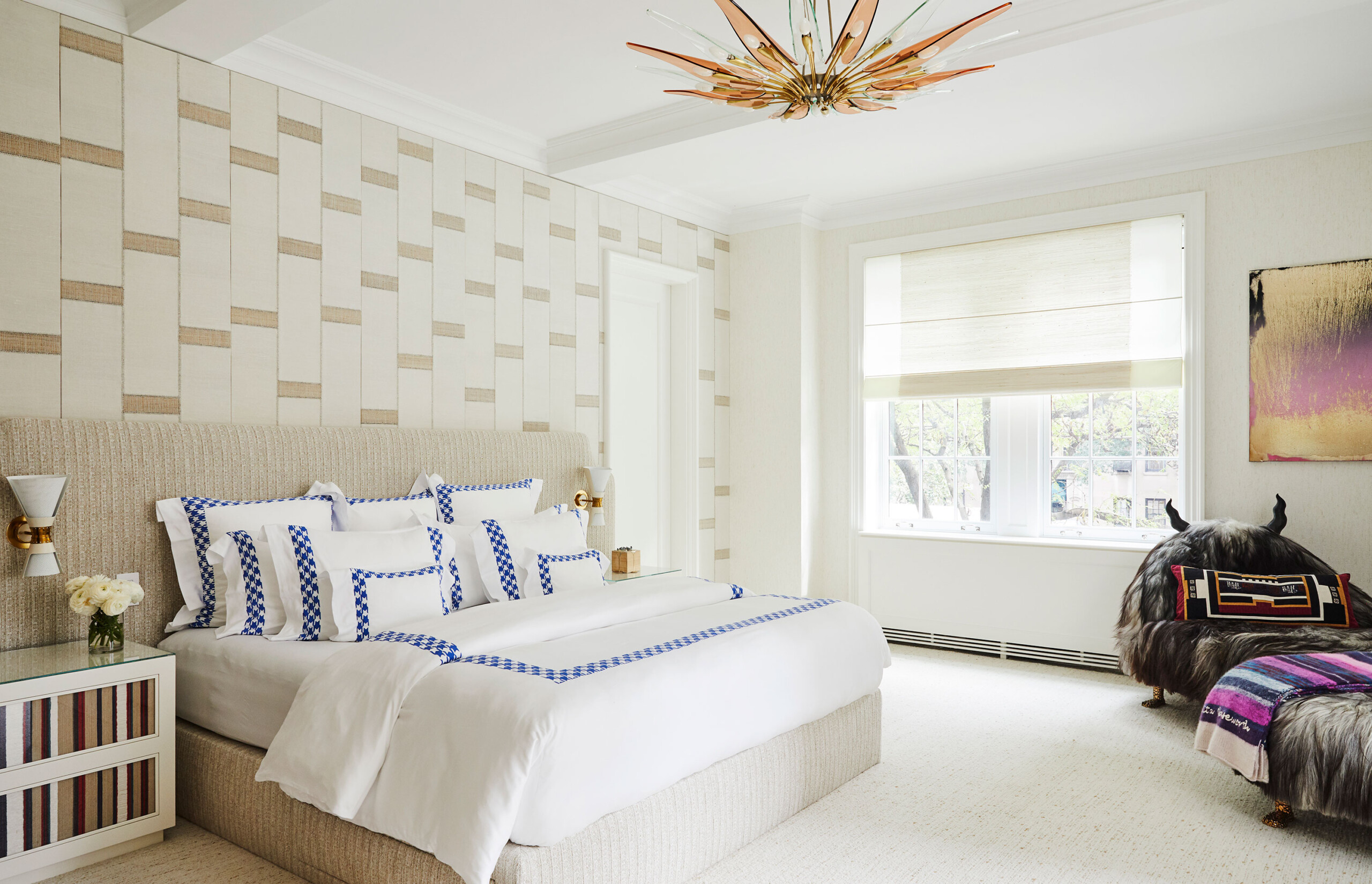 Uptown Eclectic - Pembrooke & Ives - Eclectic neutral toned bedroom with patterned wallpaper, statement...