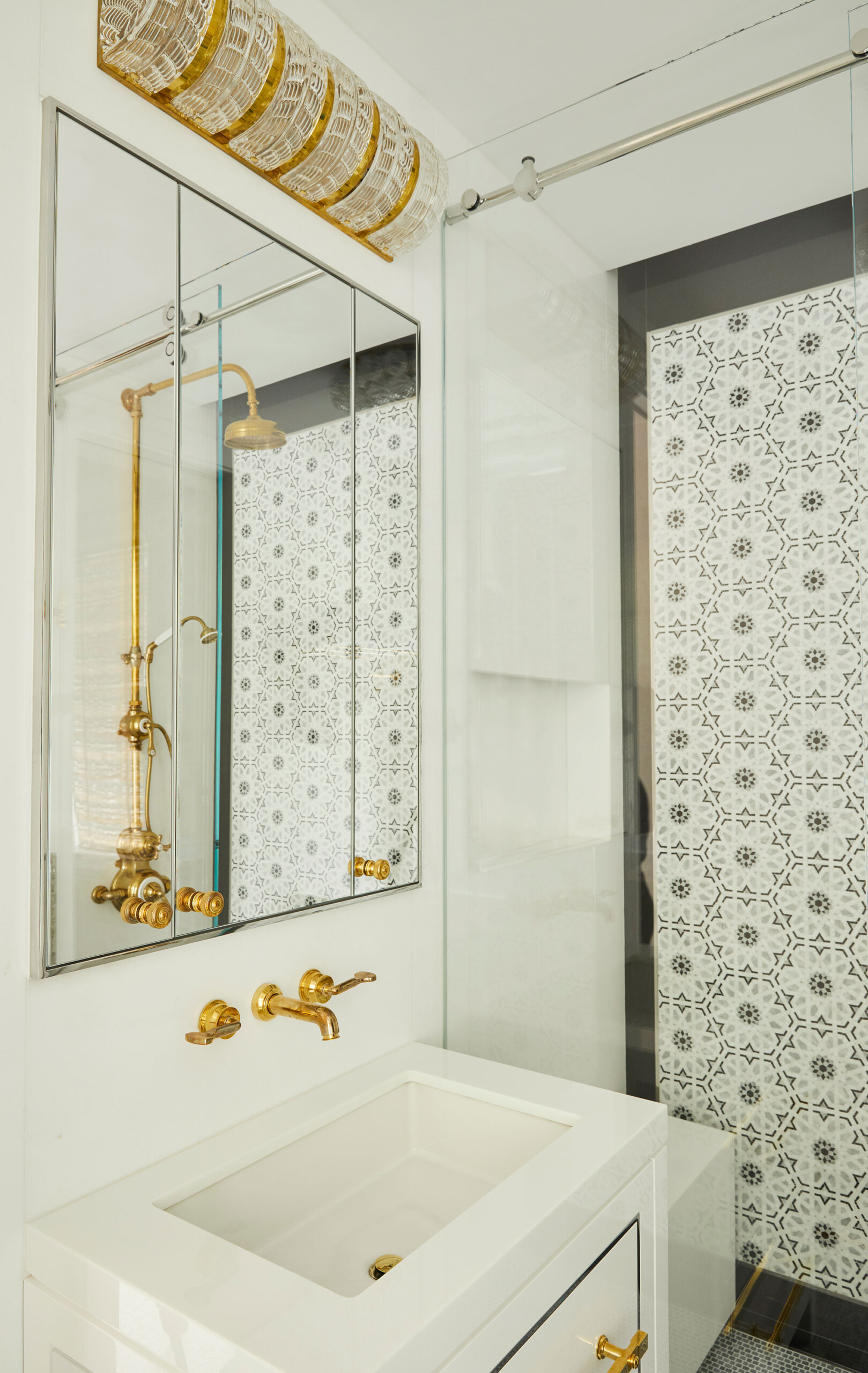 Uptown Eclectic - Pembrooke & Ives - Eclectic white bathroom with gold hardware, square sink basin,...