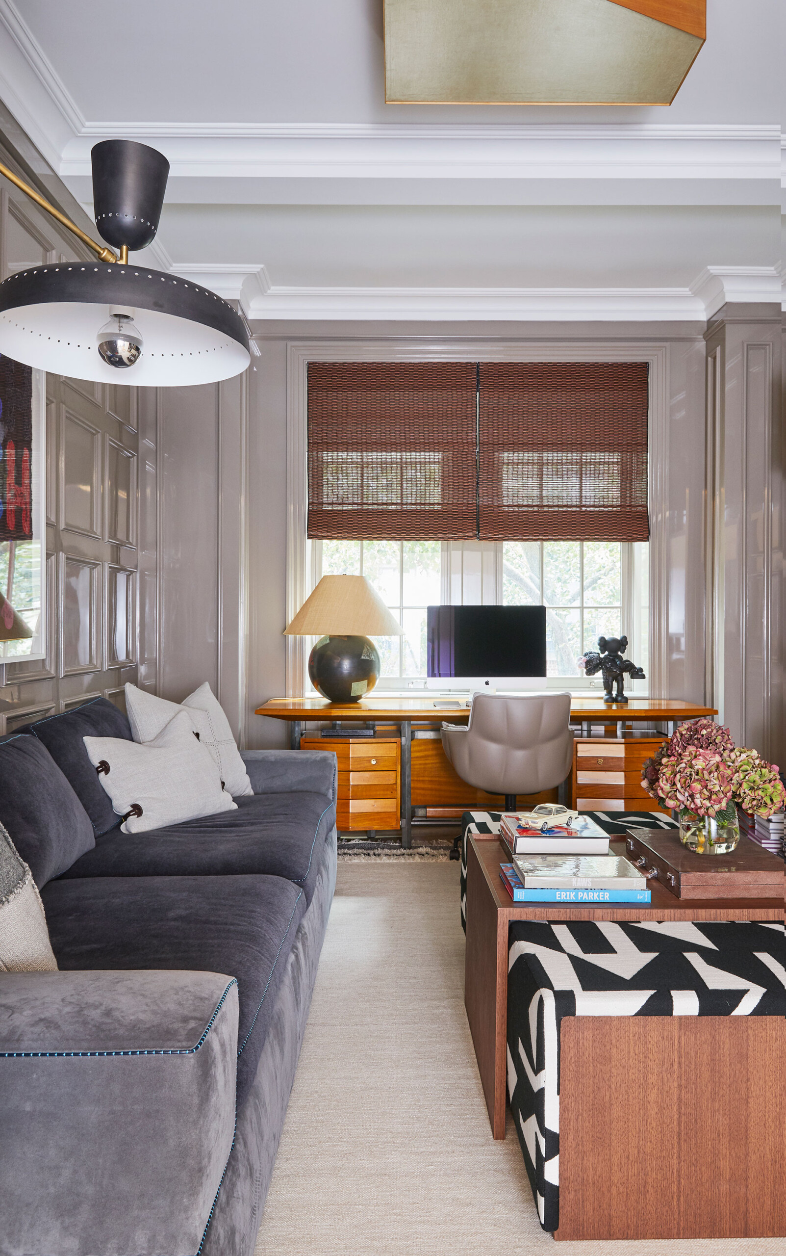 Uptown Eclectic - Pembrooke & Ives - Eclectic family room with patterned coffee table, office desk,...