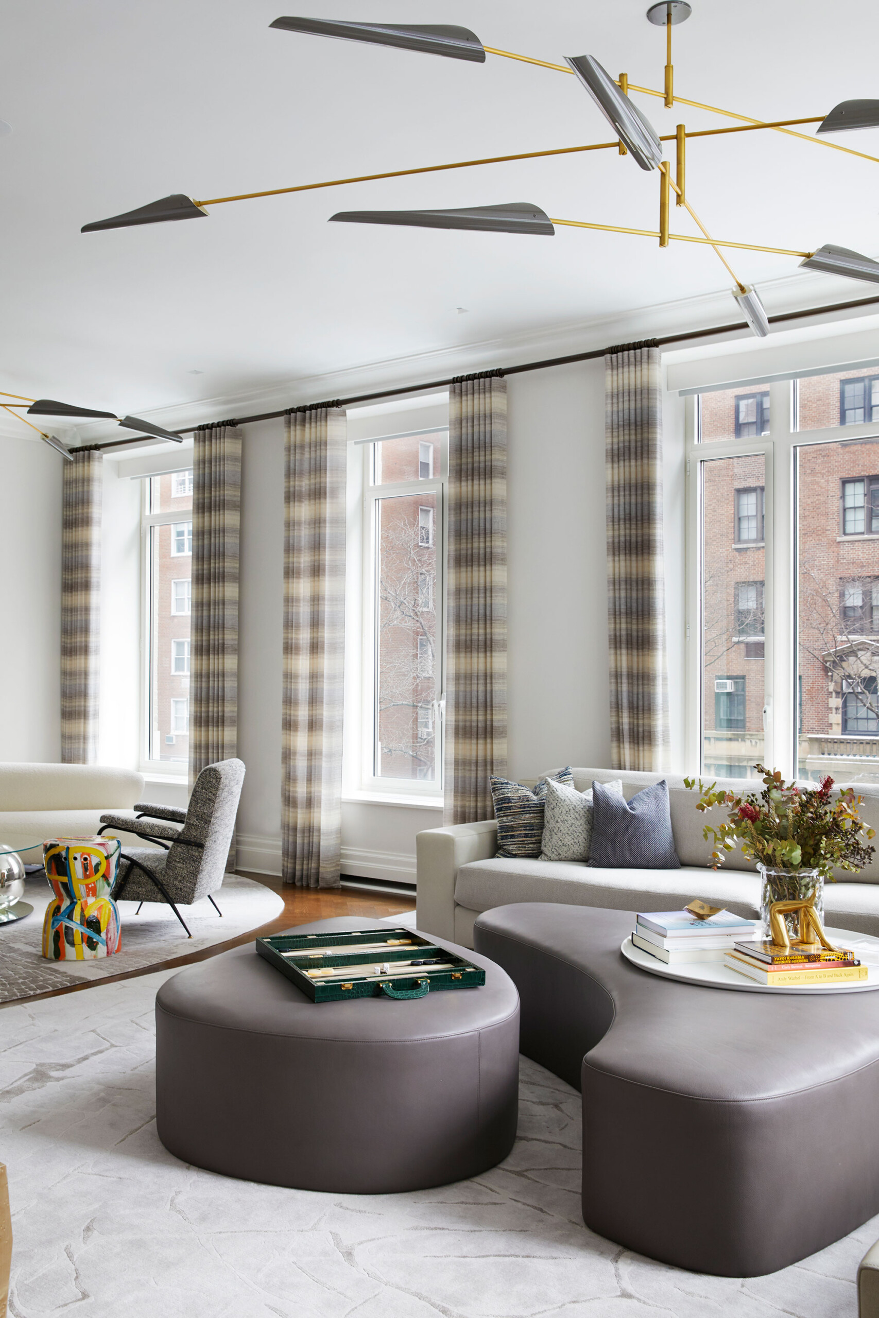 East End Avenue - Living room of New York apartment featuring leather composited coffee table and...