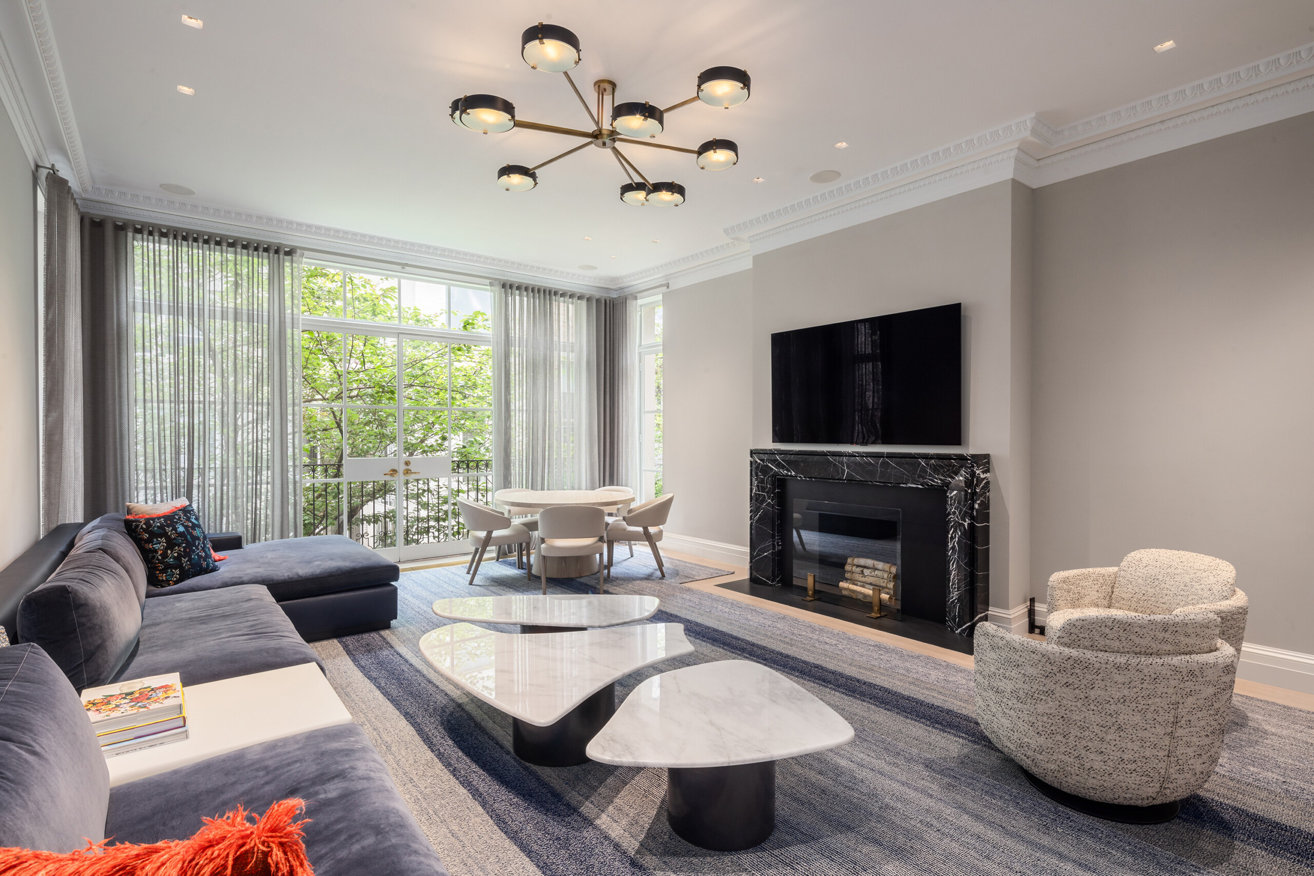 Townhouse - Living room in New York townhouse with modern sectioned marble coffee table, contemporary...