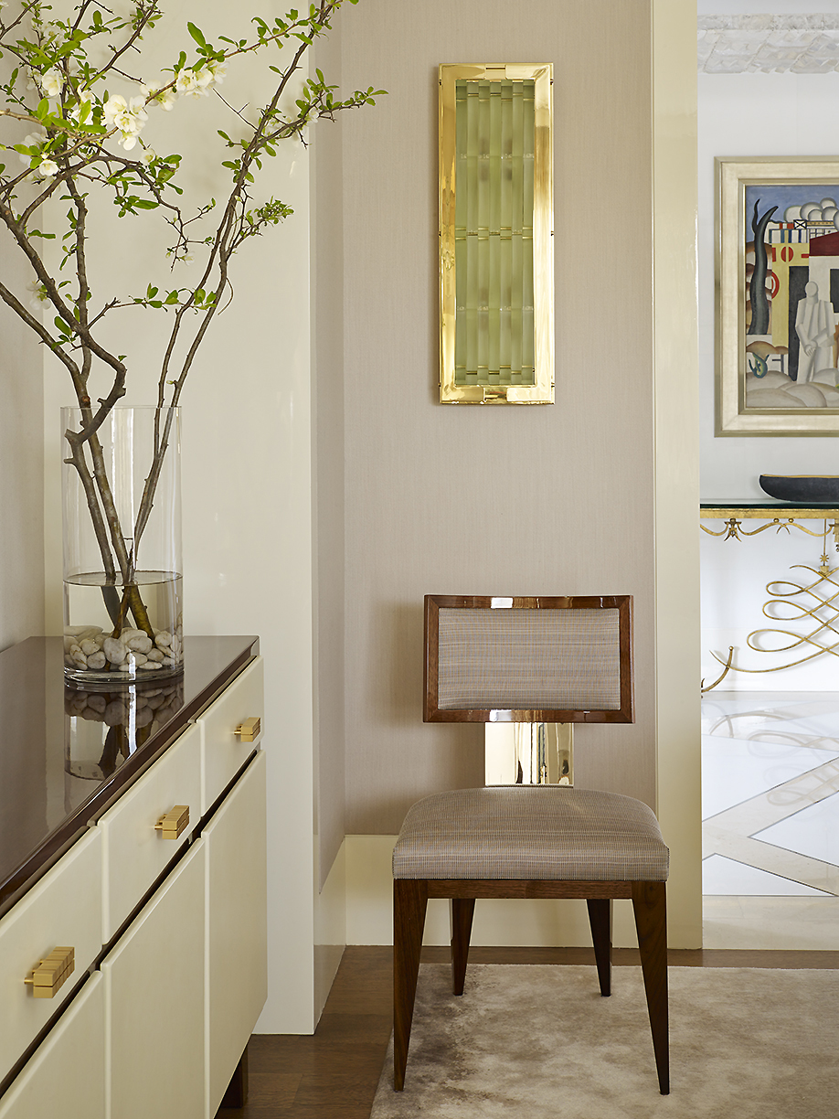 Classical Park Avenue - Details of Park Avenue apartment with modern upholstered dining chair beneath...
