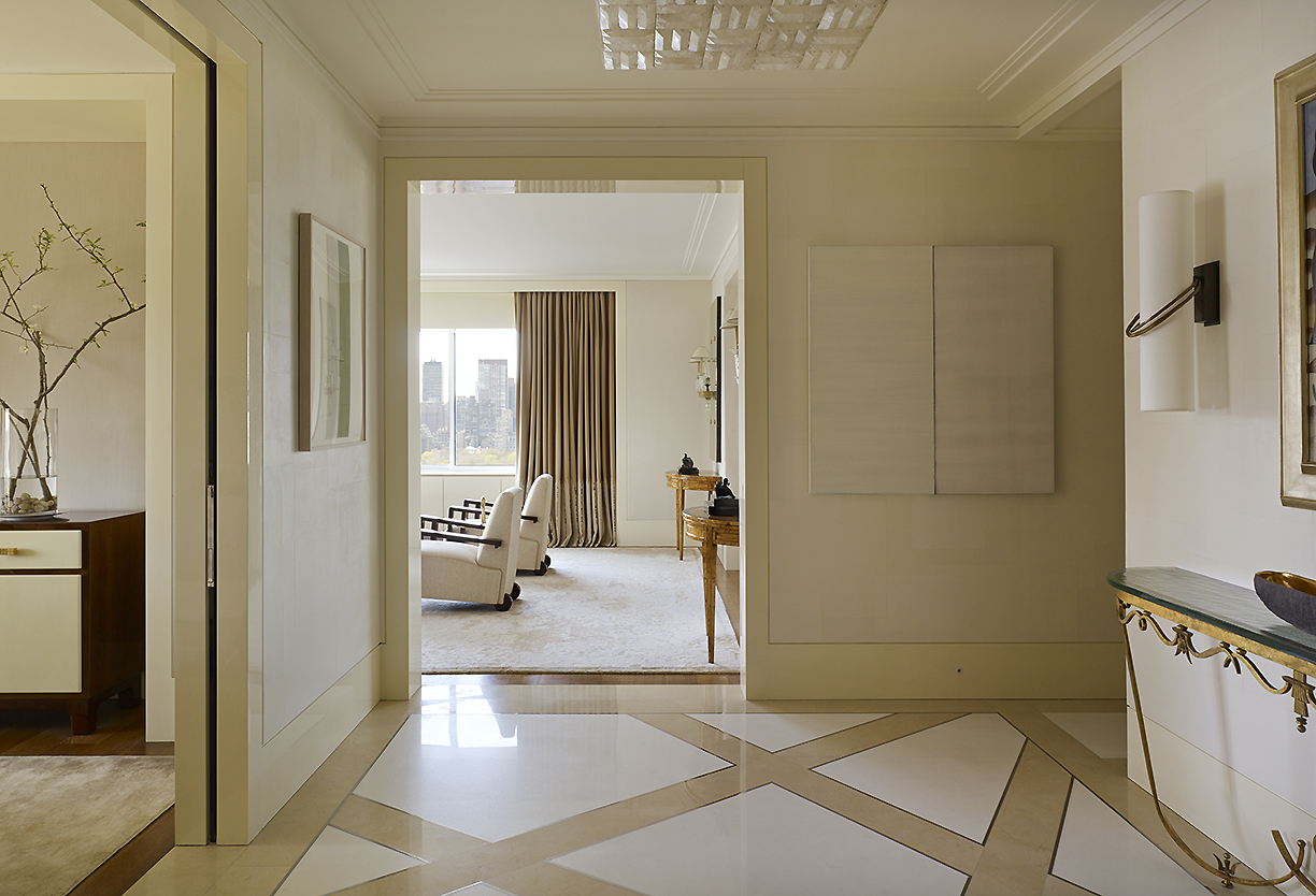 Classical Park Avenue - Entryway on Park Avenue with patterned flooring and modern wall art in...