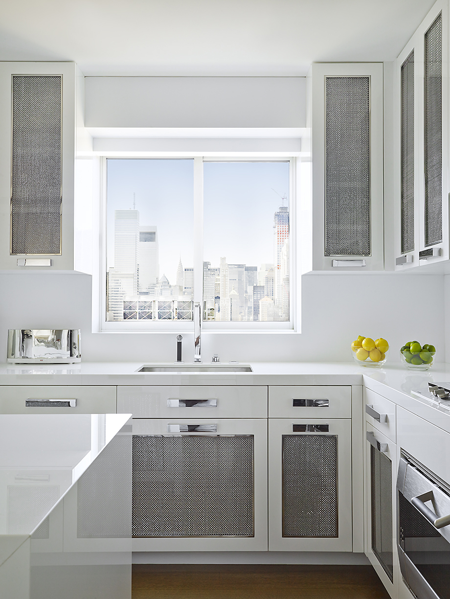 Classical Park Avenue - White modern kitchen with metallic textured inset cabinet doors and minimalist...