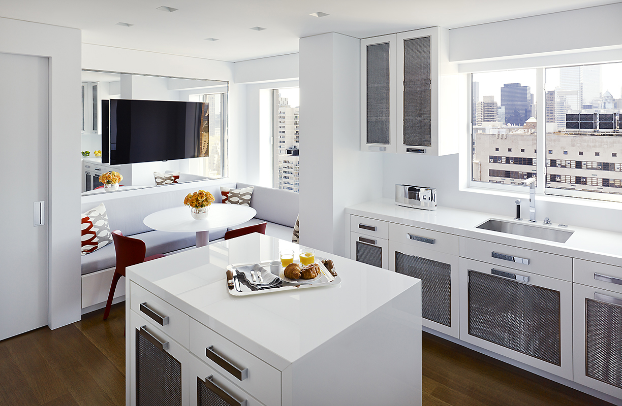 White, modern kitchen designed by Pembrooke & Ives.
