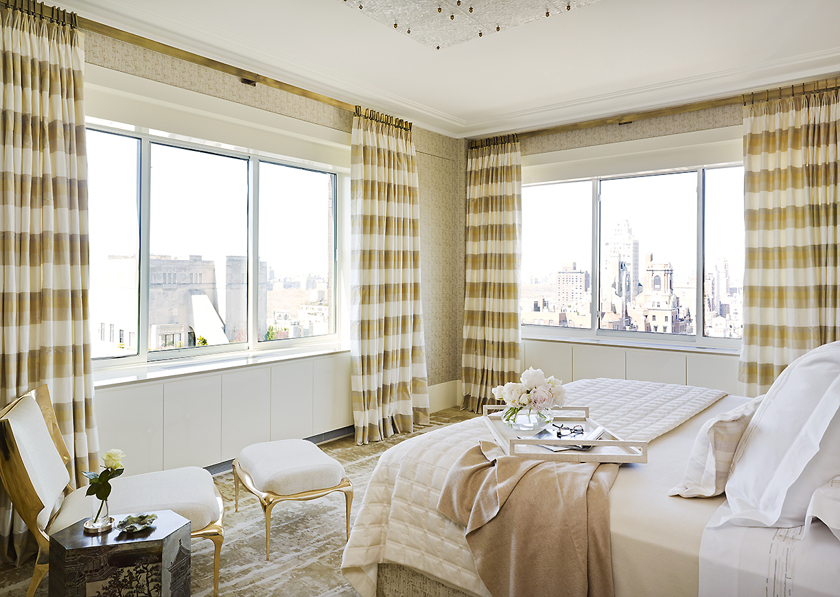 Neutral and gold bedroom designed by Pembrooke & Ives.