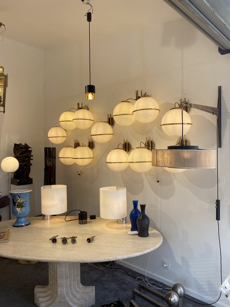 Circle lighting with gold hardware, Paul Bert Paris Showroom, Pembrooke & Ives