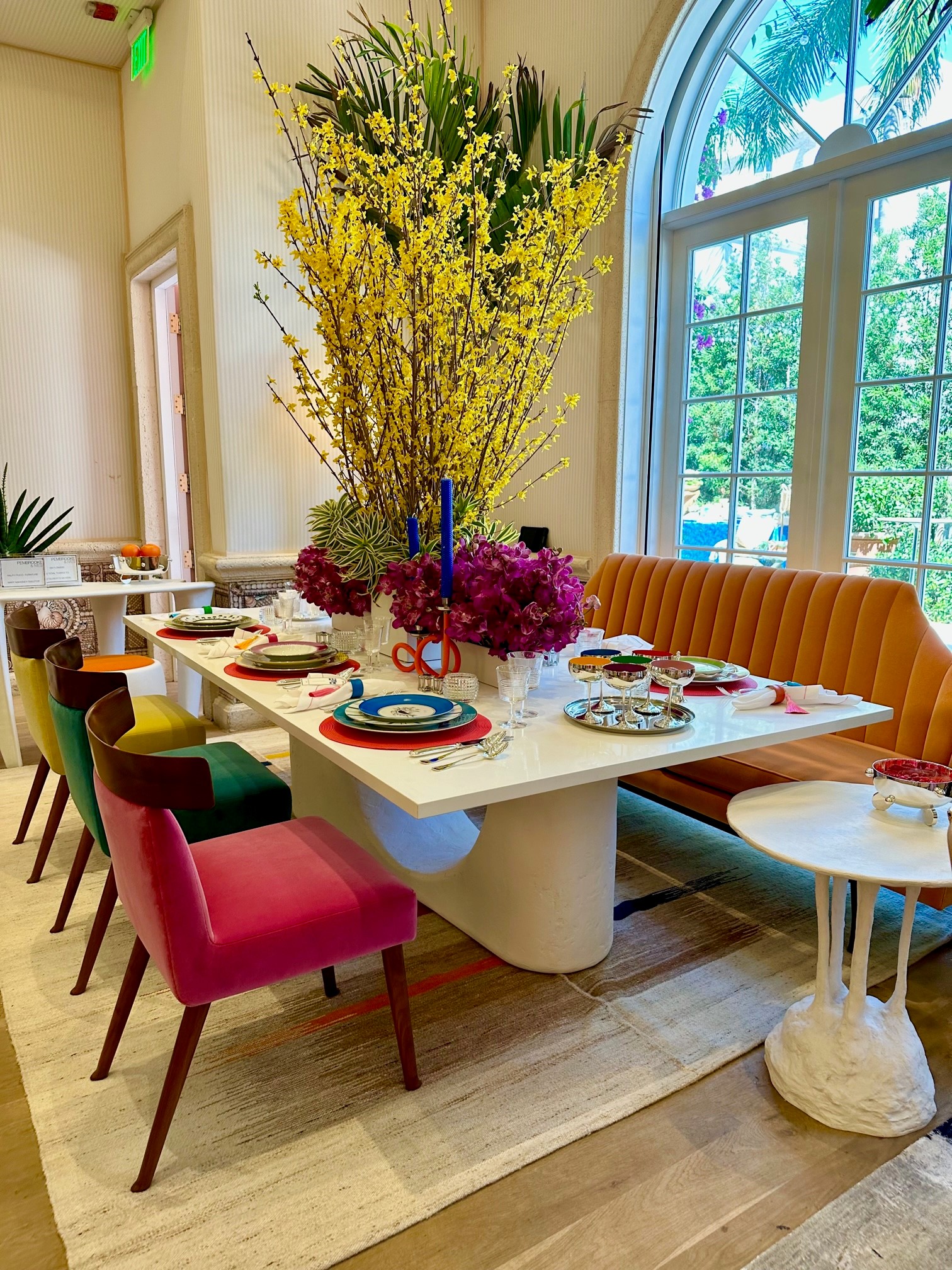 colorful place setting with whimsical flowers in Holiday House 2023, Palm Beach, Florida.