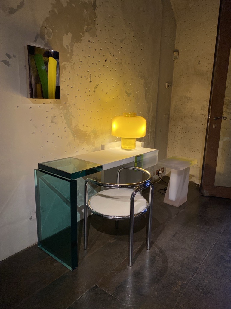 Modern desk with chrome and white chair and yellow lamp, Rossana Orlandi, 2024 Milan Design Week