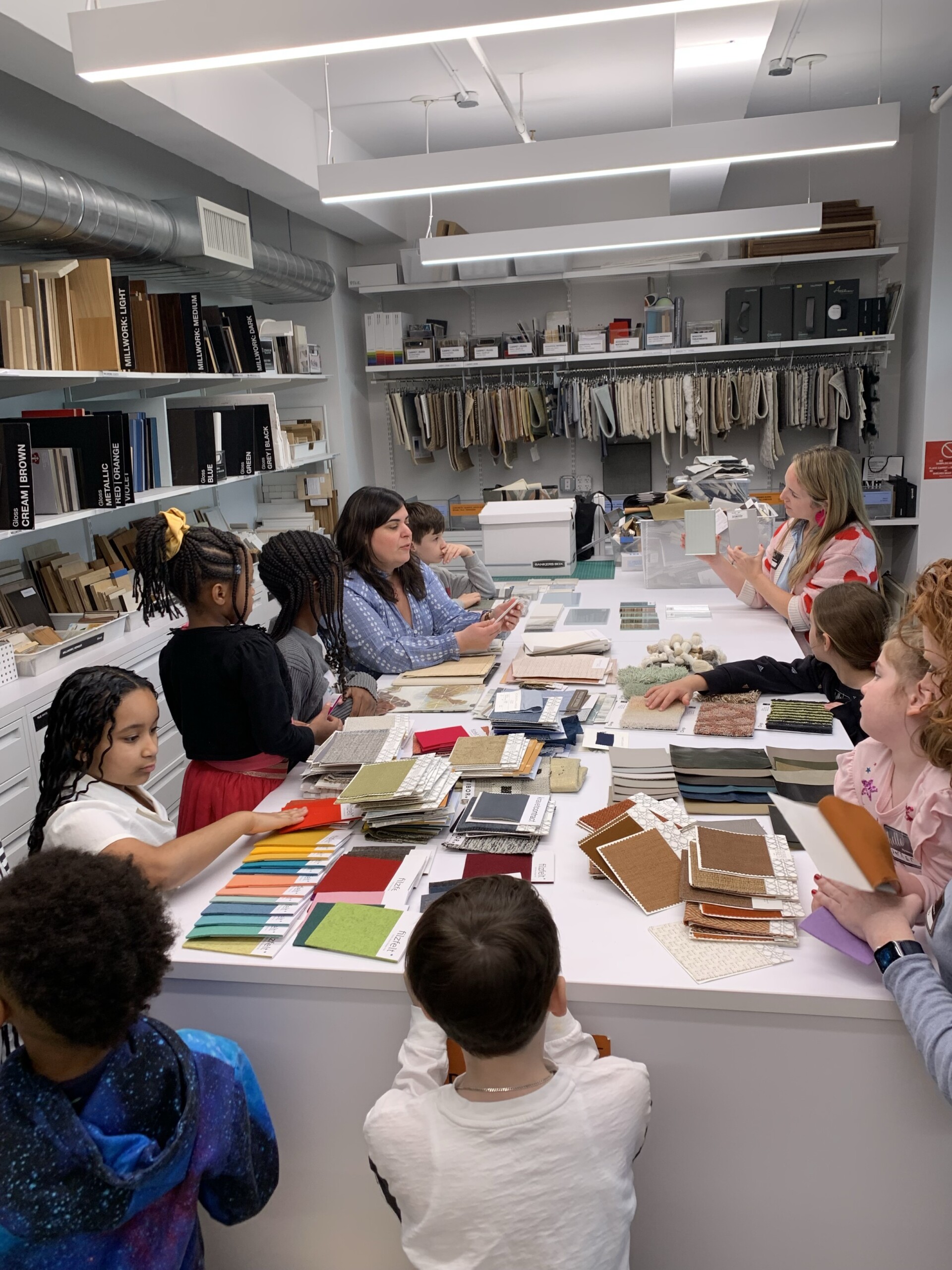 Children in material library for Pembrooke & Ives Bring your kids to work day