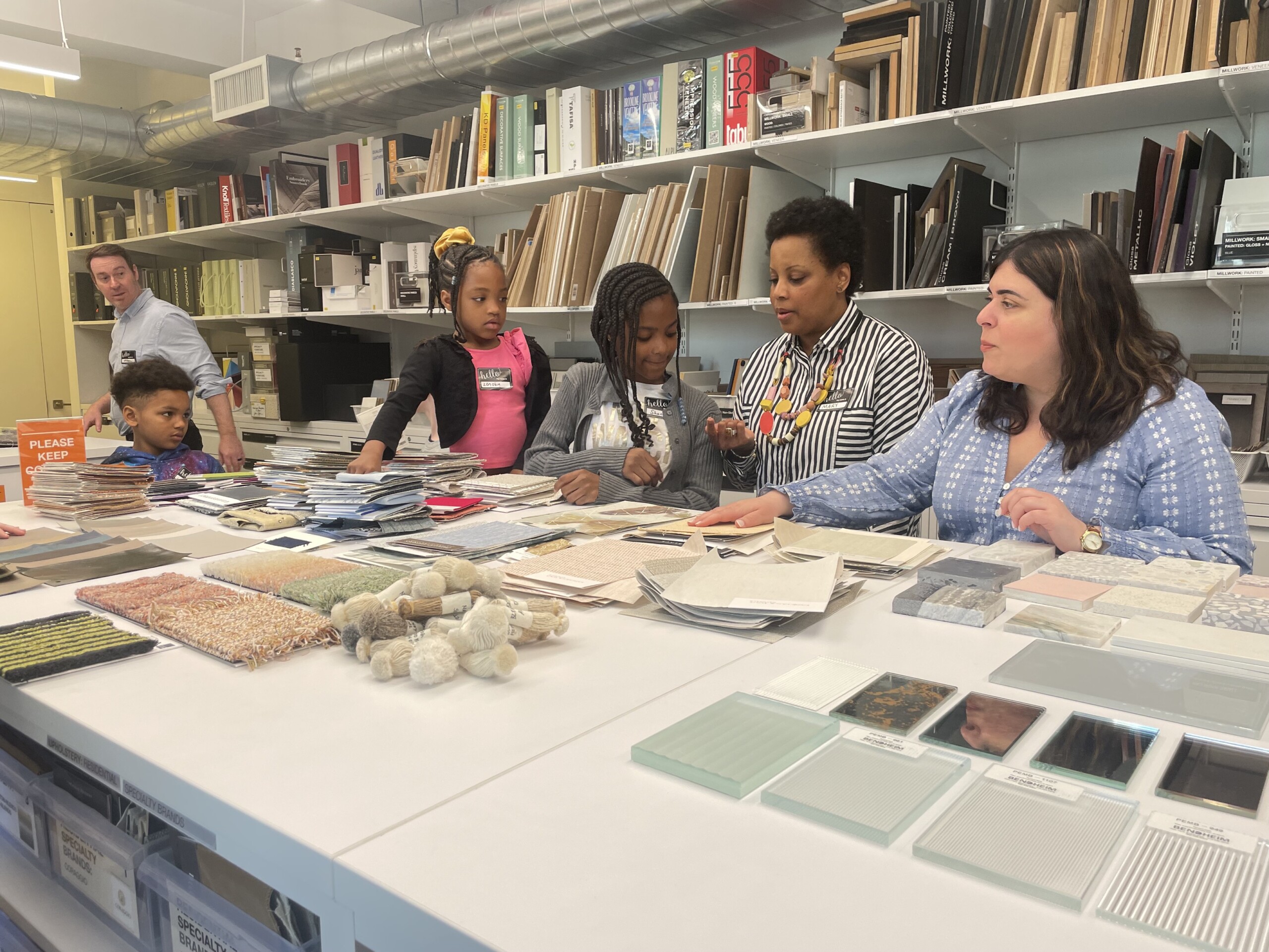 Children in material library for Pembrooke & Ives Bring your kids to work day